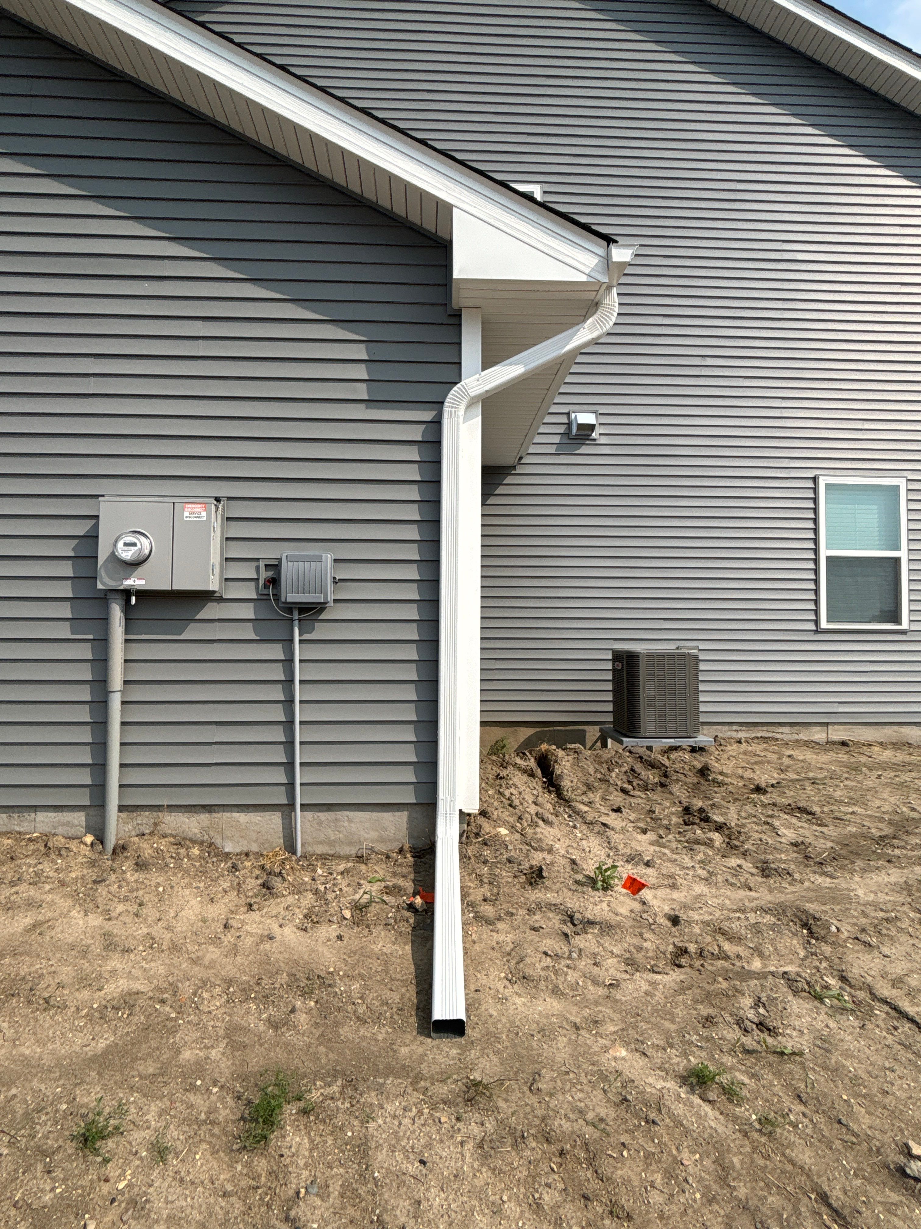 5-Inch White Seamless Gutter Installation – Otsego, MN by Next Level Seamless Gutters / Exteriors Inc.