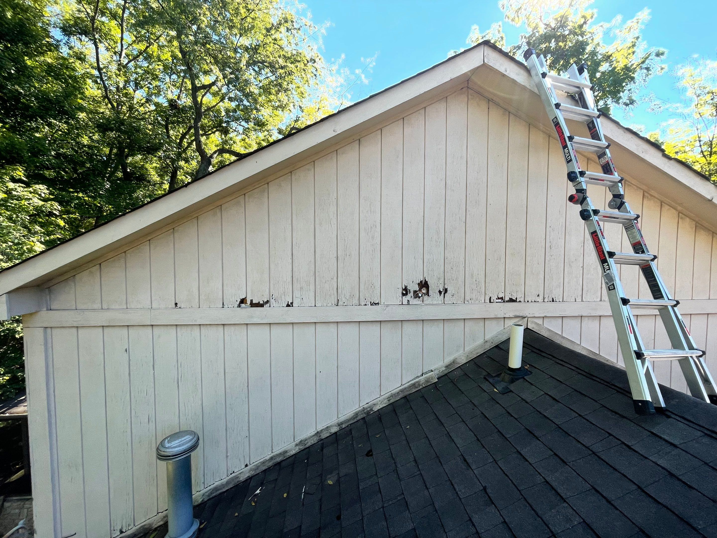 Seabreeze Roof Replacement, Exterior Siding and trim repairs and paint by 317 Roofing & Restorations