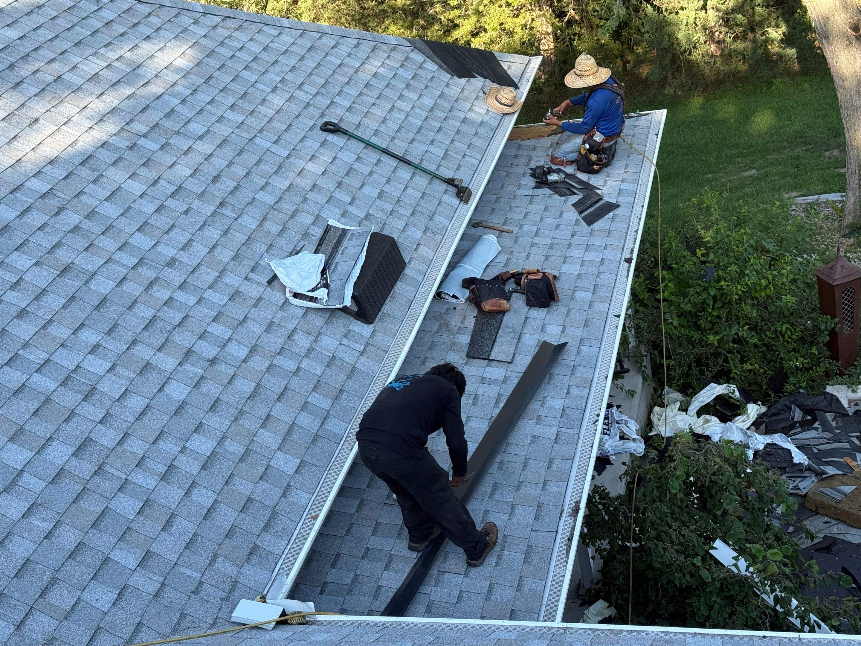 Asphalt Shingle and EPDM Membrane Roof Installation in Mineola by Star Home