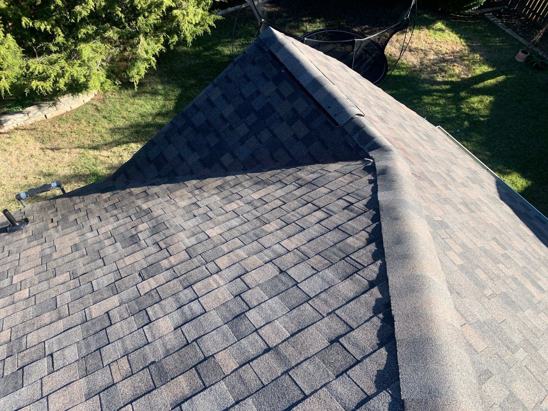 Hail Damage Restoration and Asphalt Shingle Roof Replacement in Austin by Caliber Restoration LLC