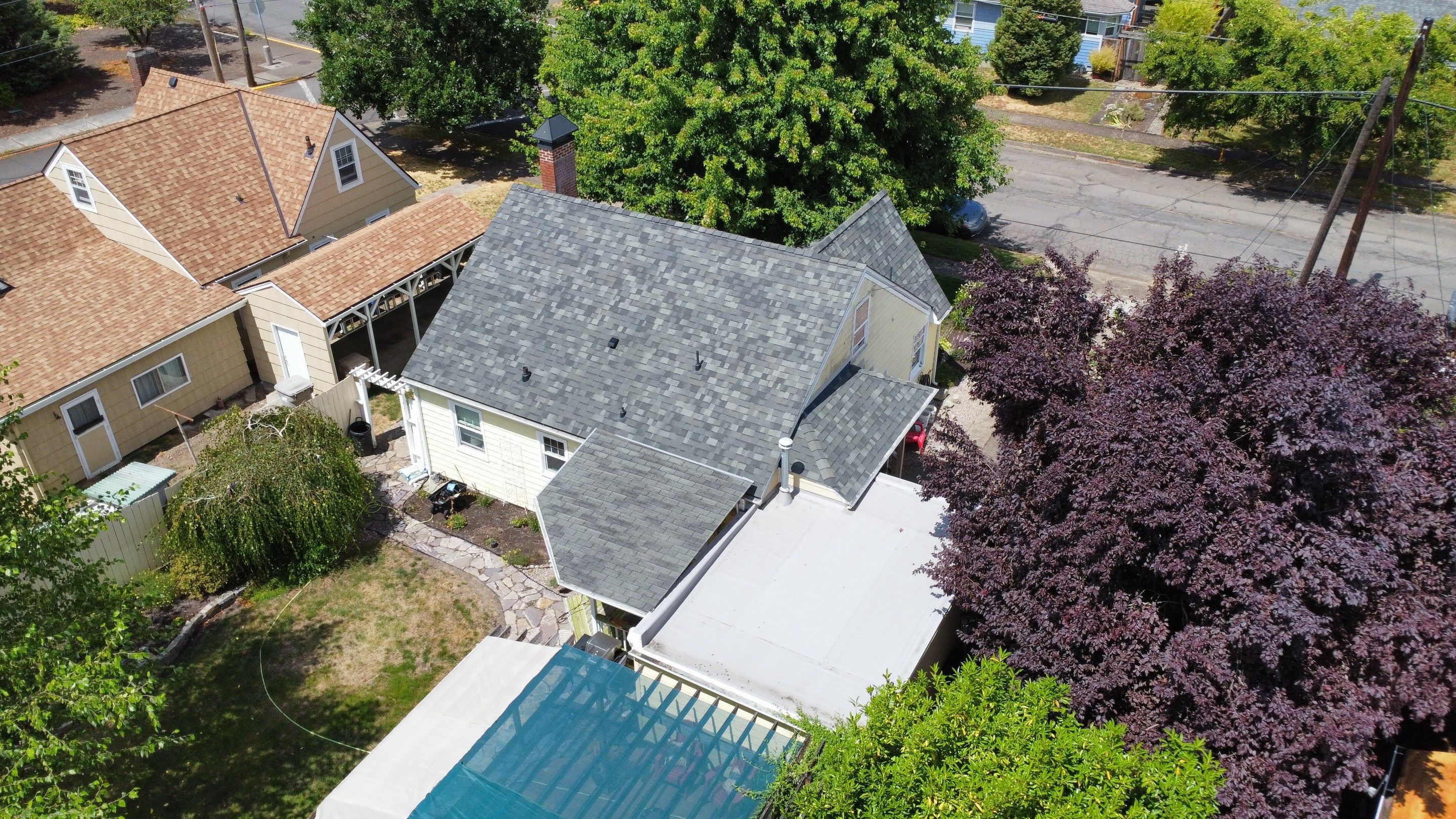 Residential Roof Installation with Added Insulation Barrier  using Malarkey Vista AR Shingles (Color: Storm Grey) by Orezona Building & Roofing Company, Inc.