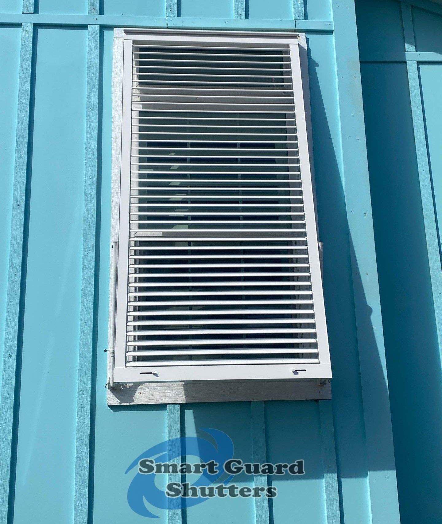 Impact Bahamas in Signal White by Smart Guard Shutters