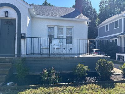 Custom Black Metal Porch and Step Railing Installation in Bethesda