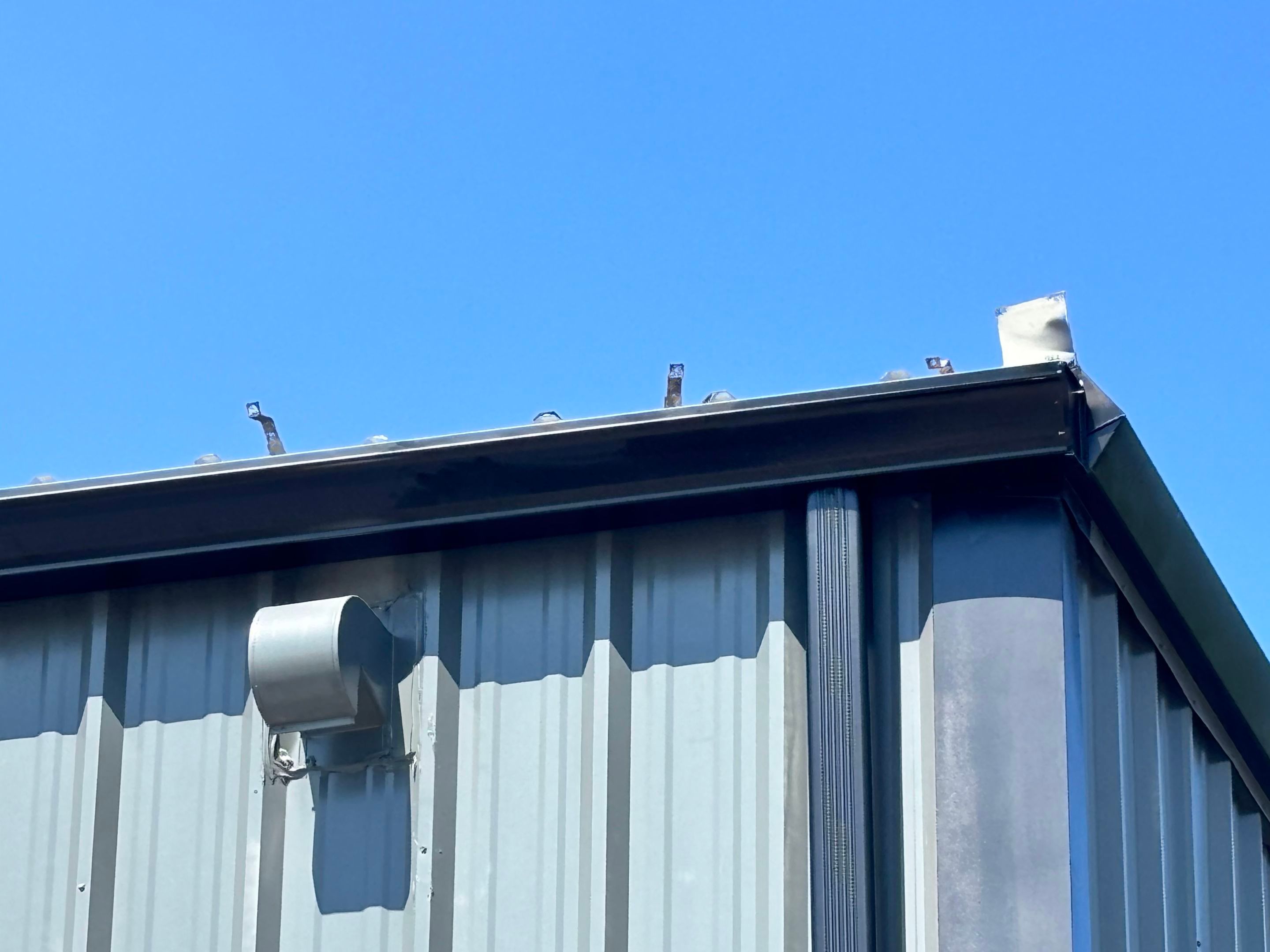 Commercial Black Gutters and Downspouts in Bonita Springs, FL by Gutter Professors