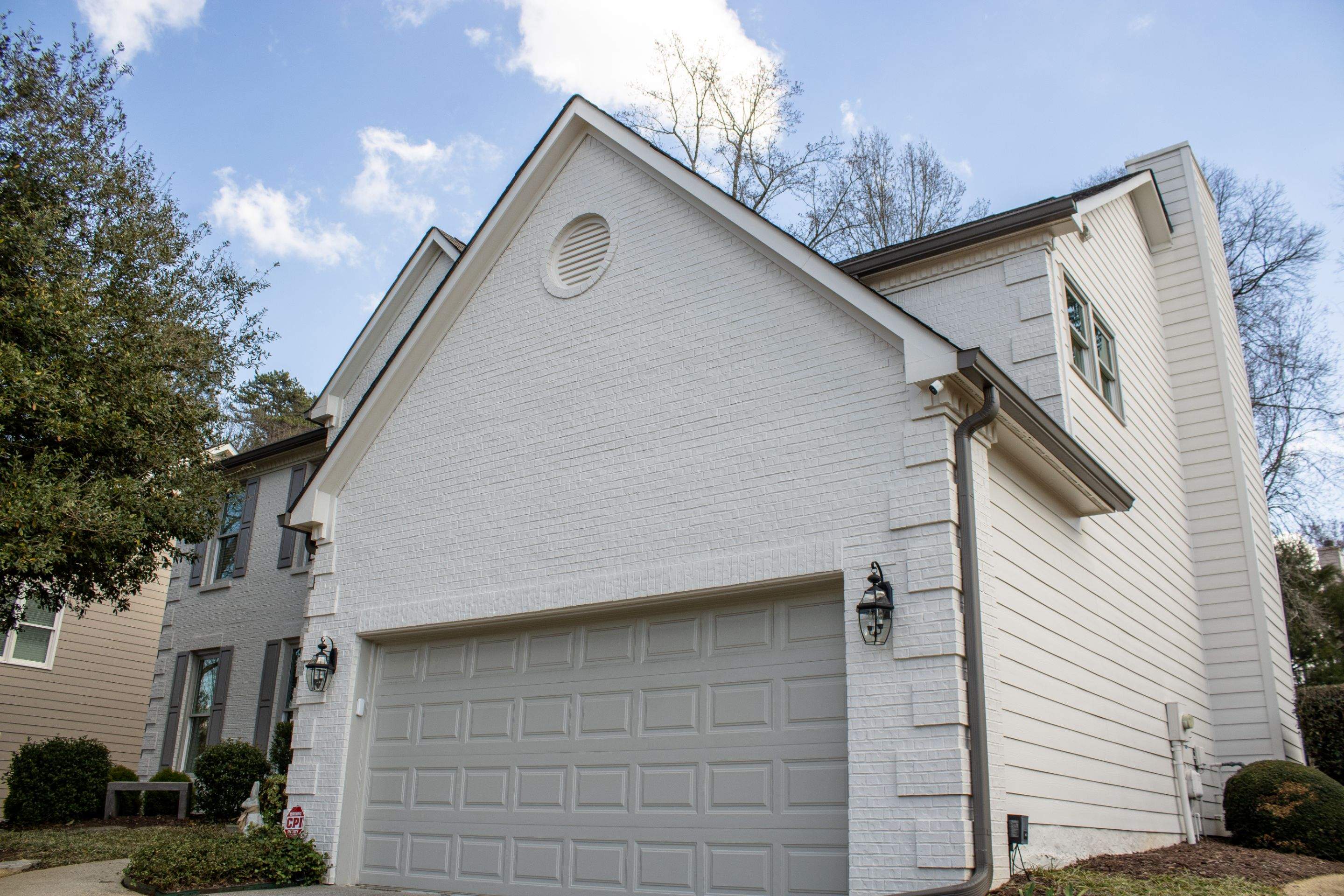 Exterior Painting, James Hardie Siding Install, and Gutter Replacement in Alpharetta, GA - After Results Taken Six Years After Painted by Nelson Exteriors 