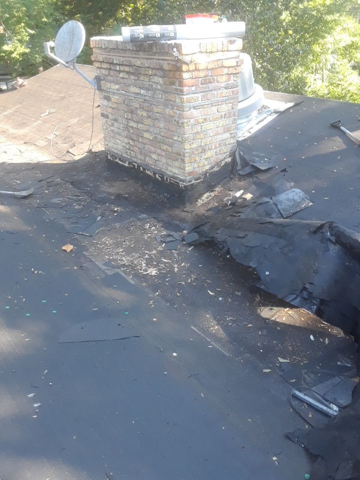 Commercial Roofing Installation using Roof Replacement by American Roofing & Construction LLC