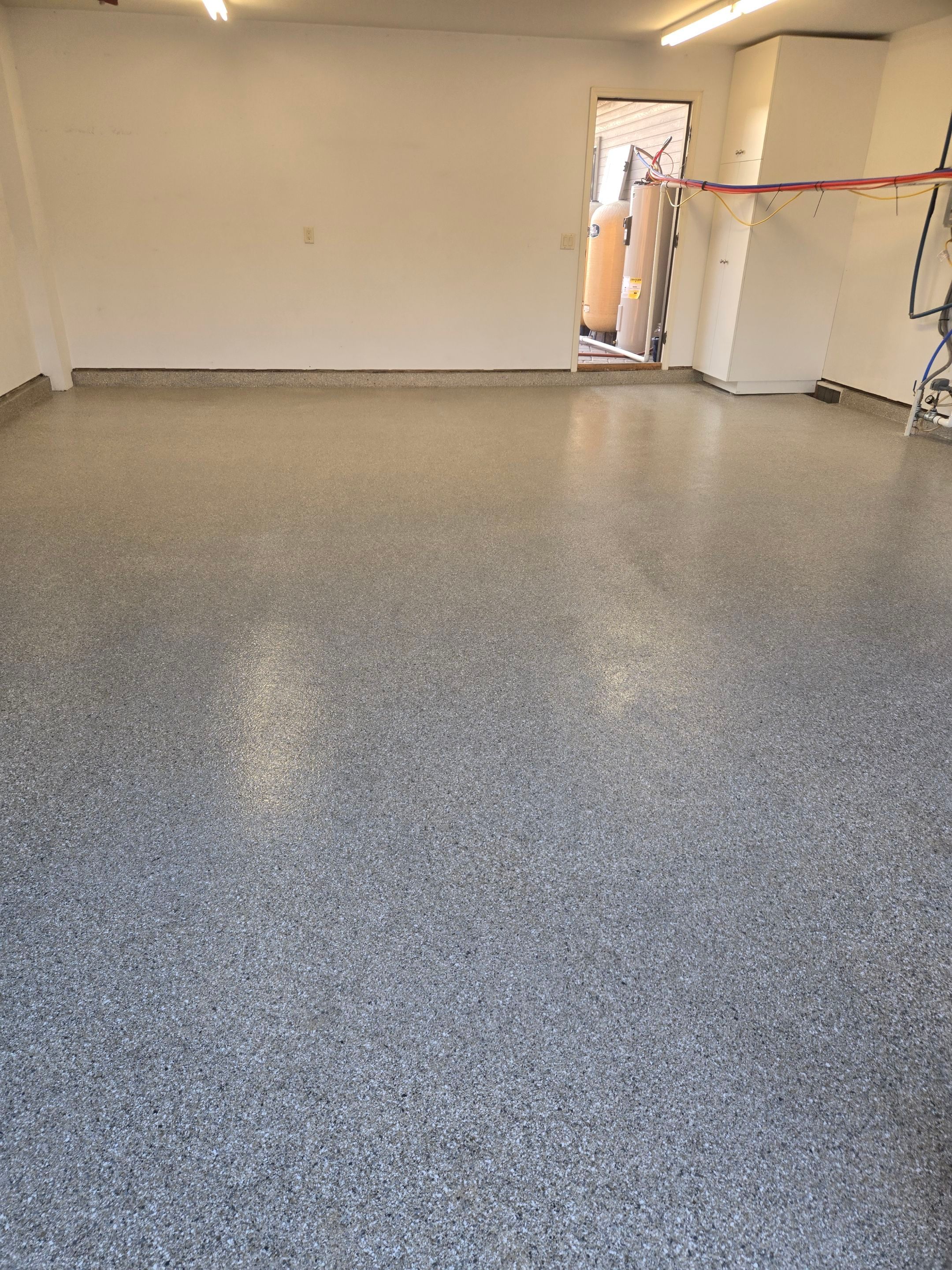 Garage Transformation using Quartzite Hybrid by Croc Coatings, LLC