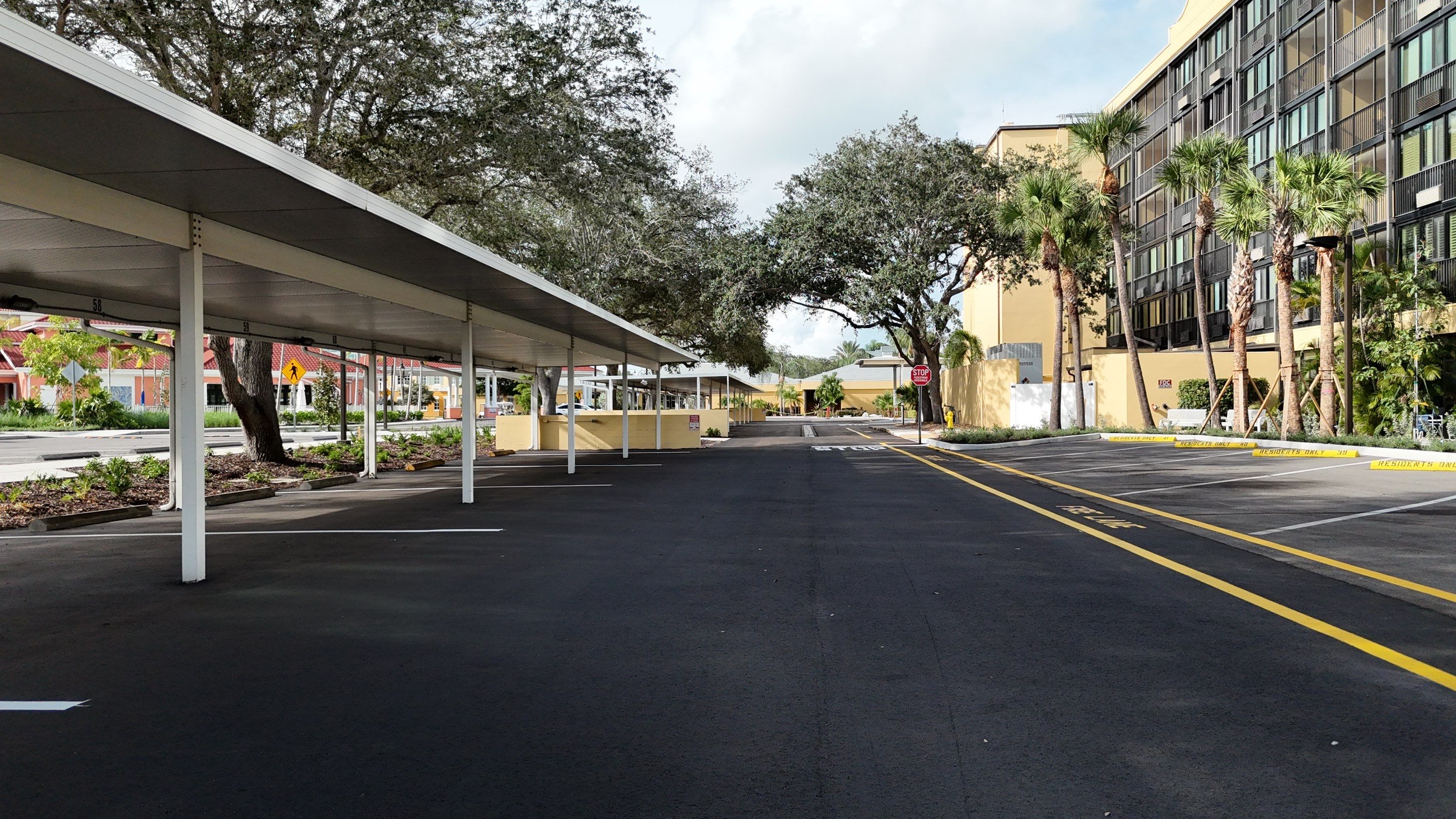 Comprehensive Parking Lot Mill and Overlay with Custom Line Striping in Venice by Everline Coatings & Services - Southwest FL