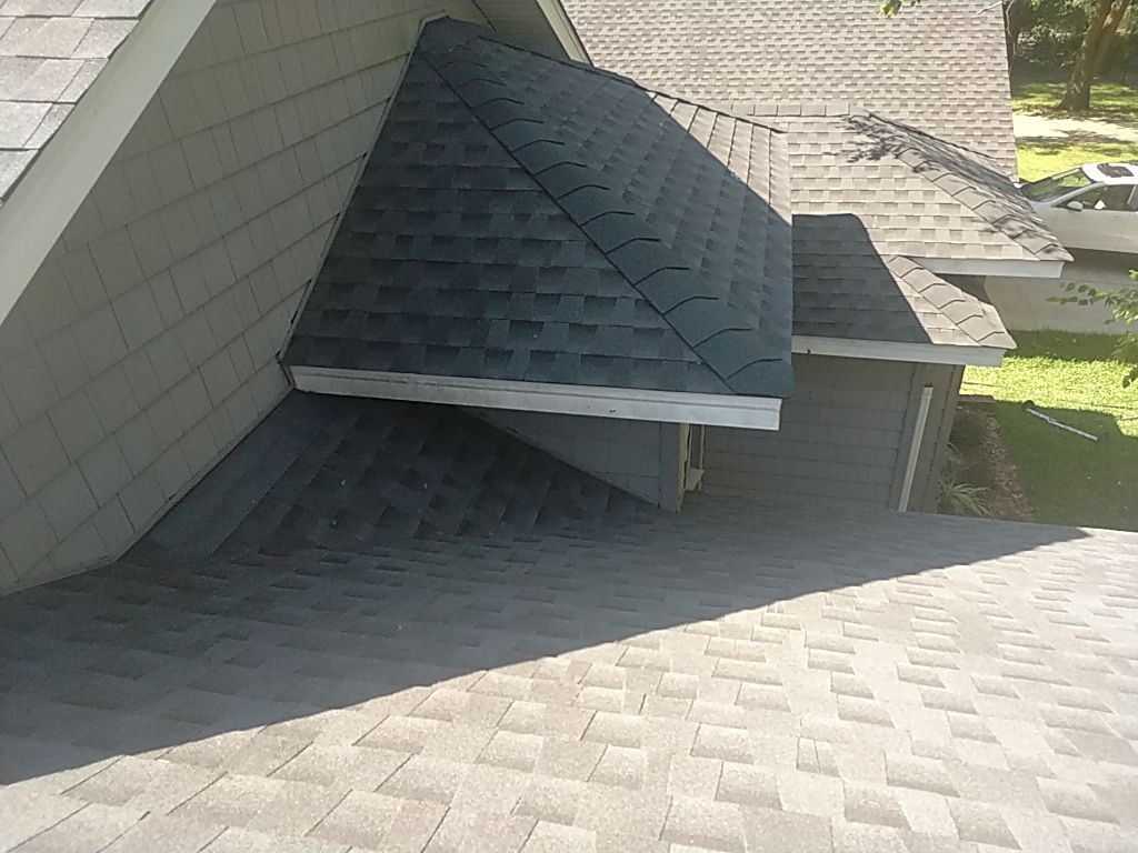 Residential Roofing Installation using Roof Replacement by American Roofing & Construction LLC