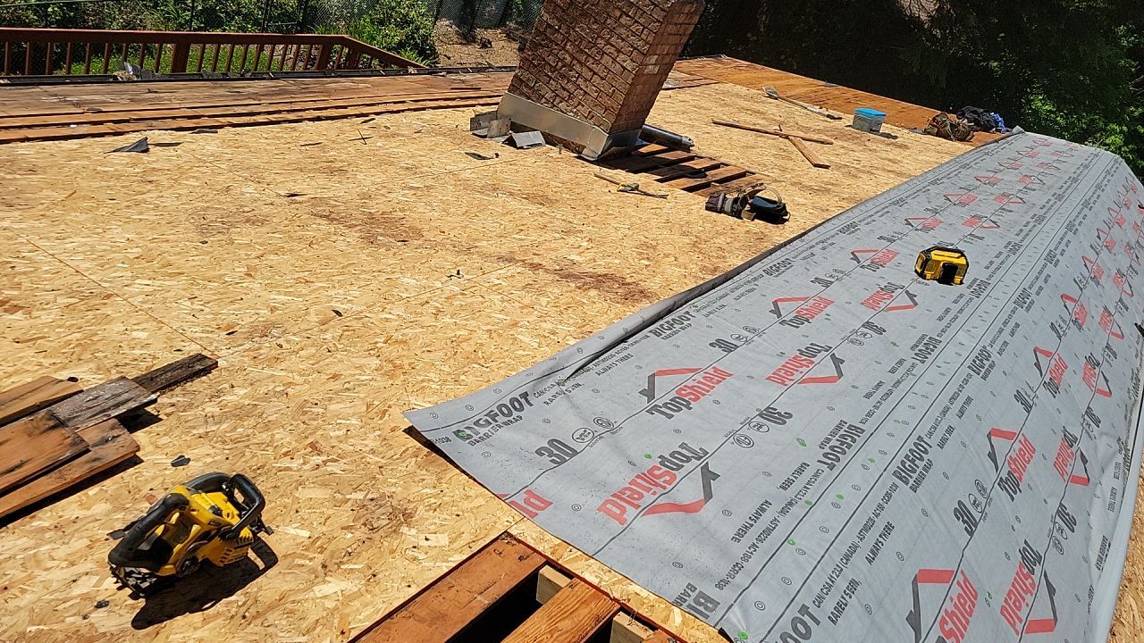Residential Roofing Installation using Malarkey Highlander with GAF 60mil TPO by Orezona Building & Roofing Company, Inc.