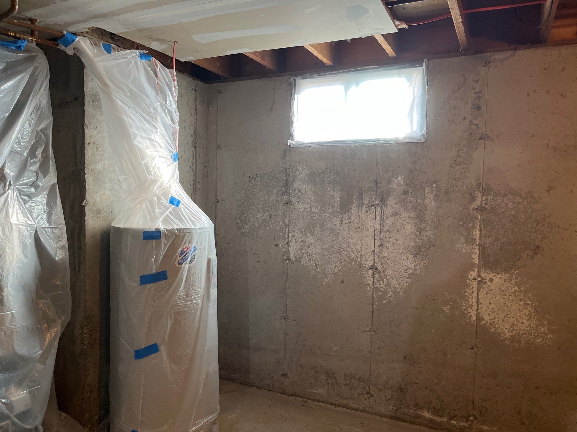 Basement Exterior Walls using Closed Cell Spray Foam by NYS Foam & Energy