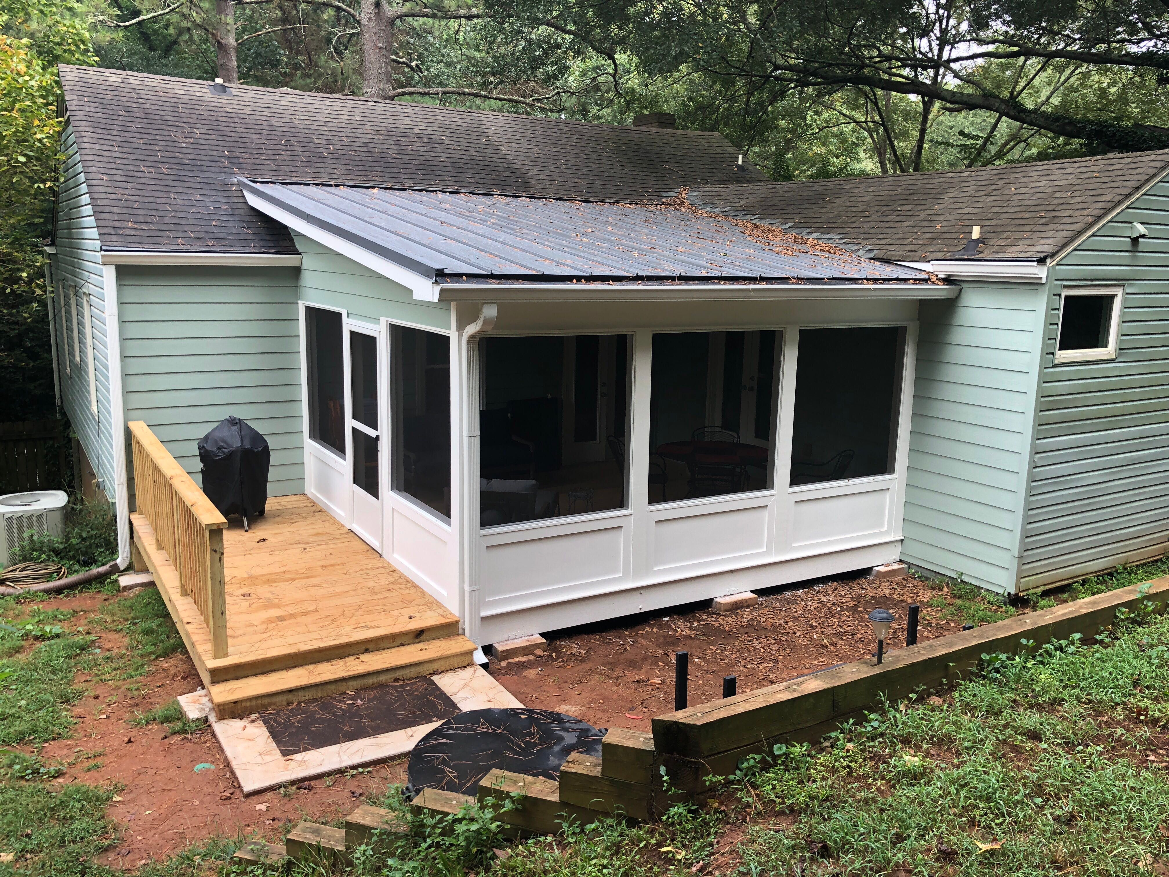 Custom Screened Porch with Metal Roof and Deck in Decatur by Swift Home Renovations