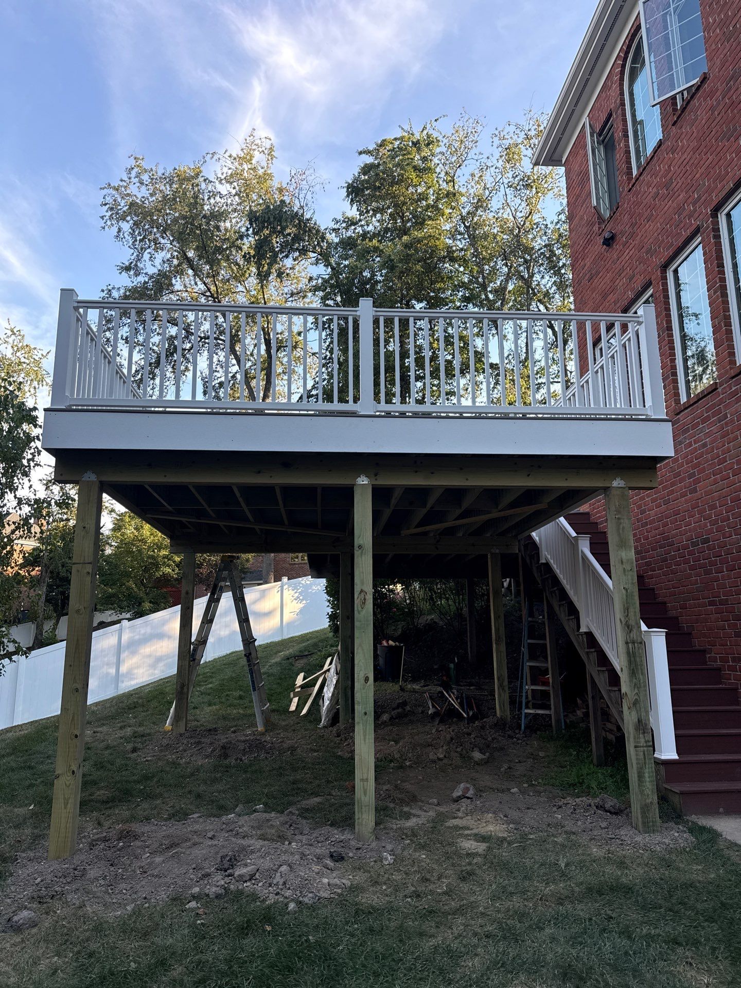 Deck extension  by Cousins Roofing Siding & Decks