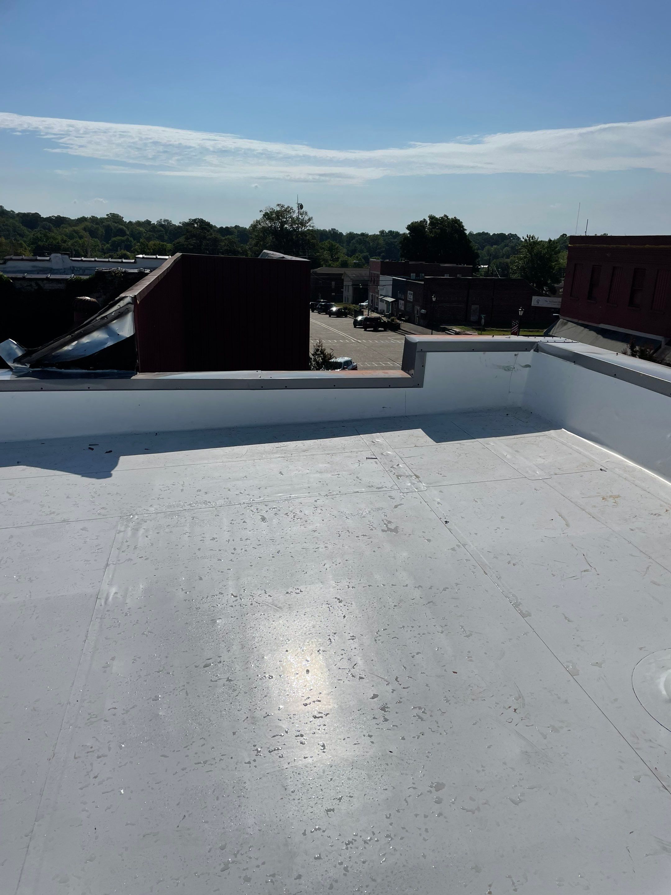 Commercial Roofing Installation in DeQueen, AR, using 50 mil PVC by Hostetler Roofing