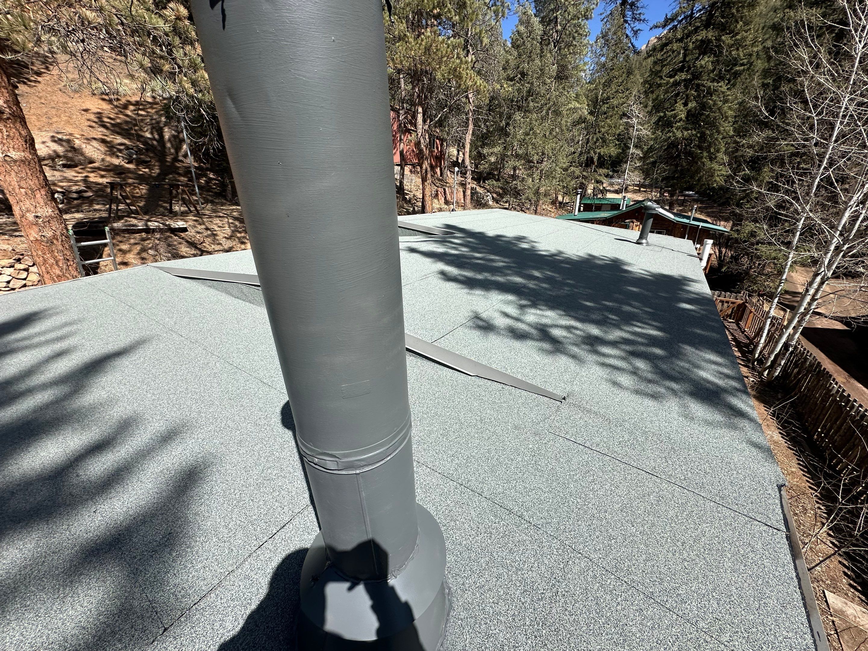 Residential Roofing Installation using Modified Bitumen Roofing by Blue Peaks Roofing LLC 