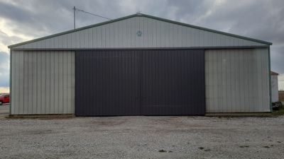 Replace worn out pole barn doors by Dagny Builders