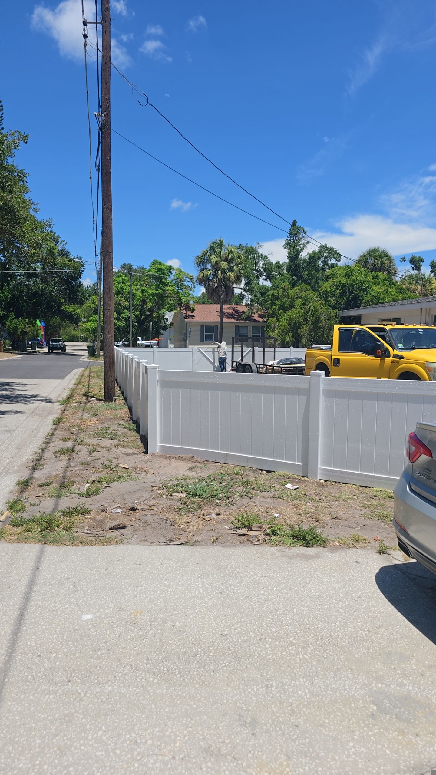 White Vinyl Privacy Fence and Gate Installation in Bradenton by True Fence LLC