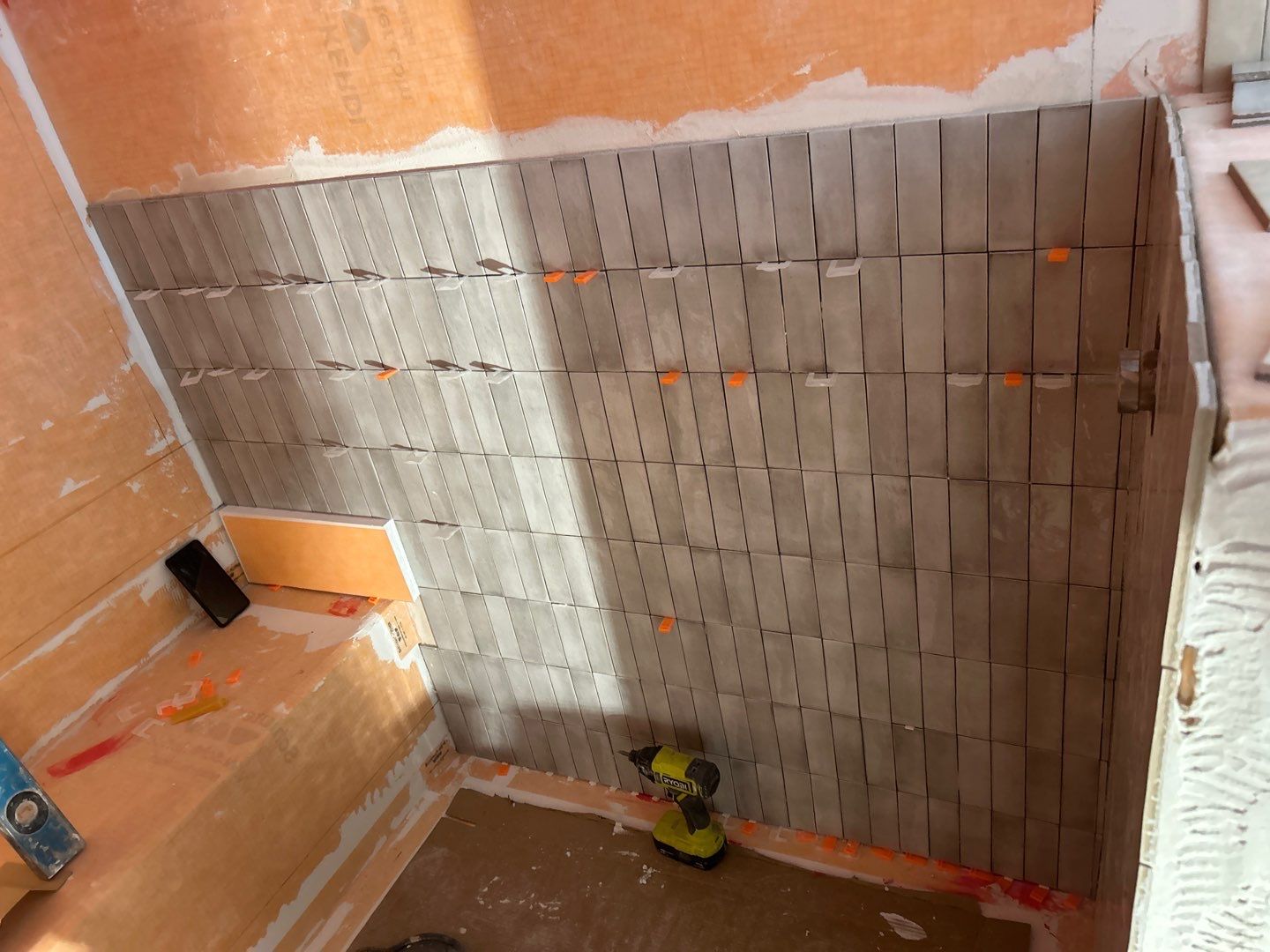 Tile floors, walls, showers, and accent wall for bathrooms  by Footprints Floors of Nashville