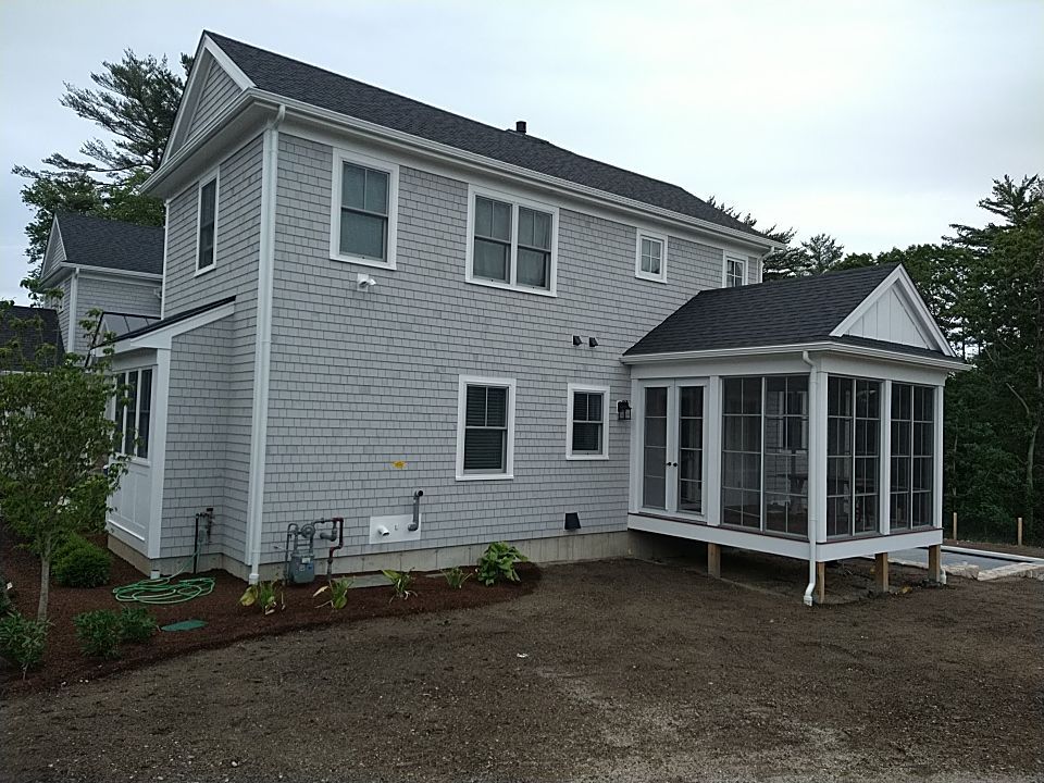 K-Style Gutter Installation with Round Downspouts in Marshfield, MA by Gutter Pro Enterprises
