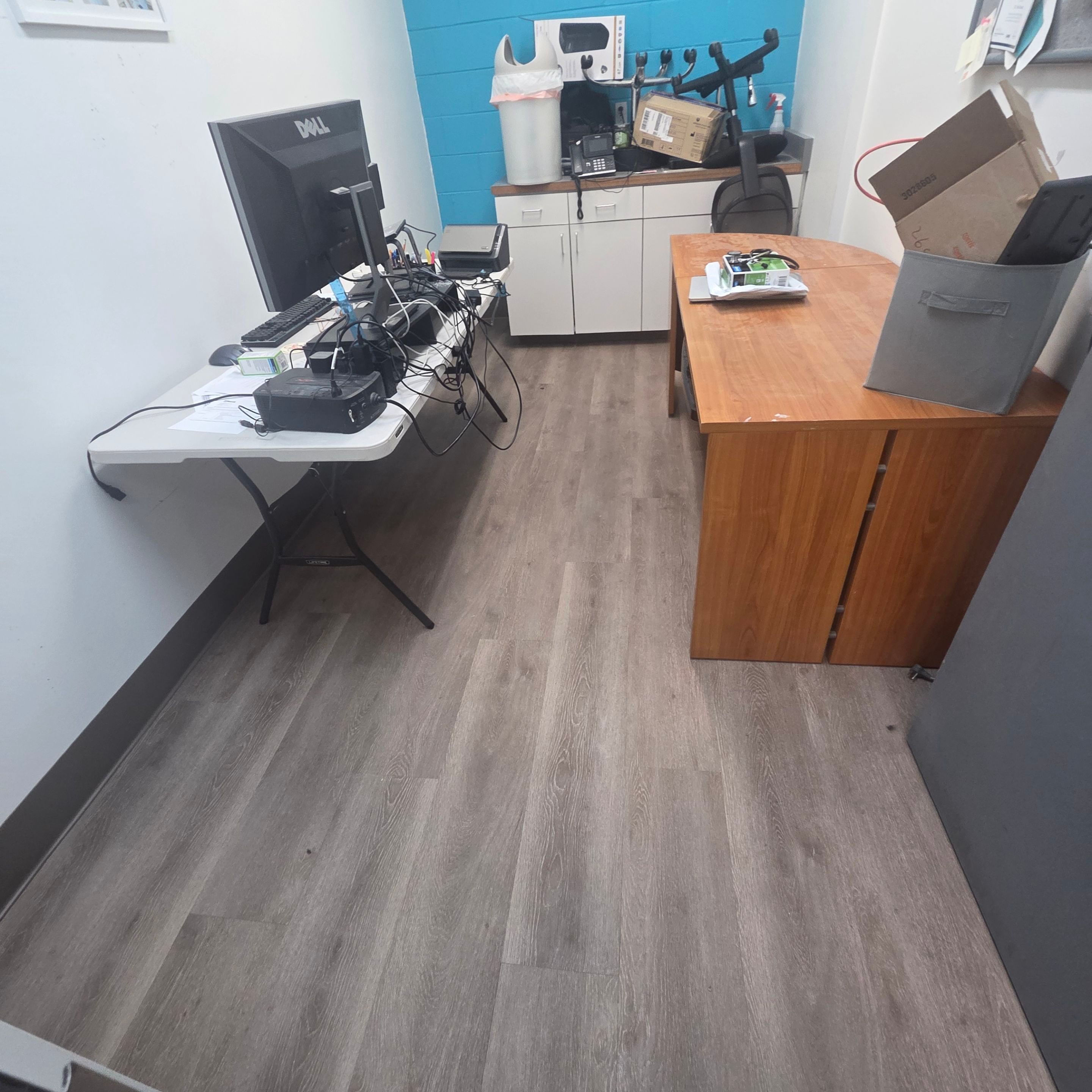 Commercial Vinyl Plank Flooring Installation at Dunwoody Veterinary Clinic by Flooring Xpress CO 