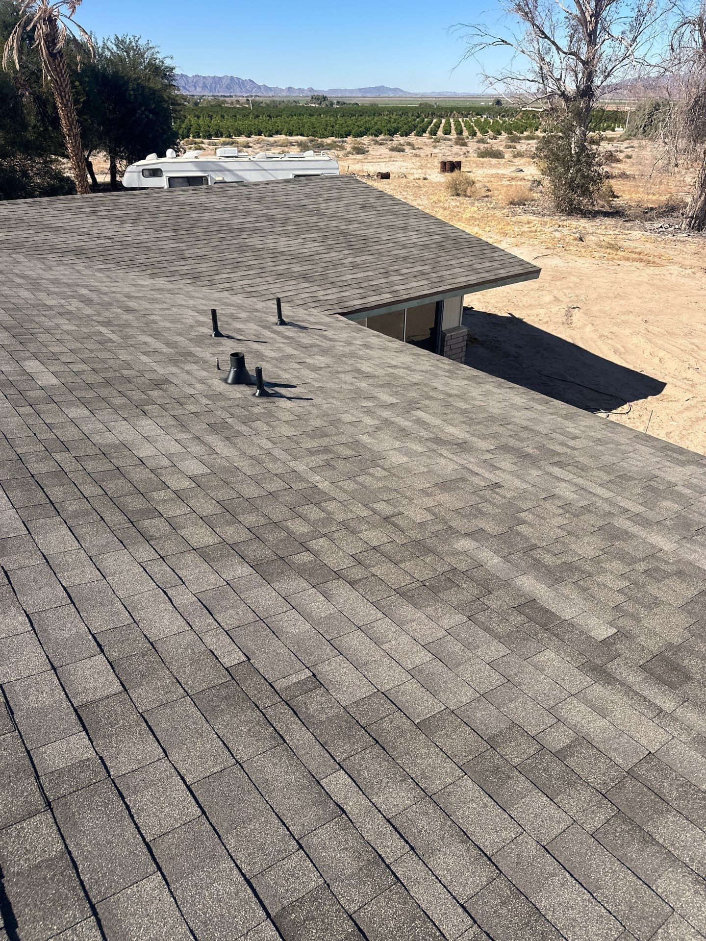 Estate Gray Shingles by Reimagine Roofing