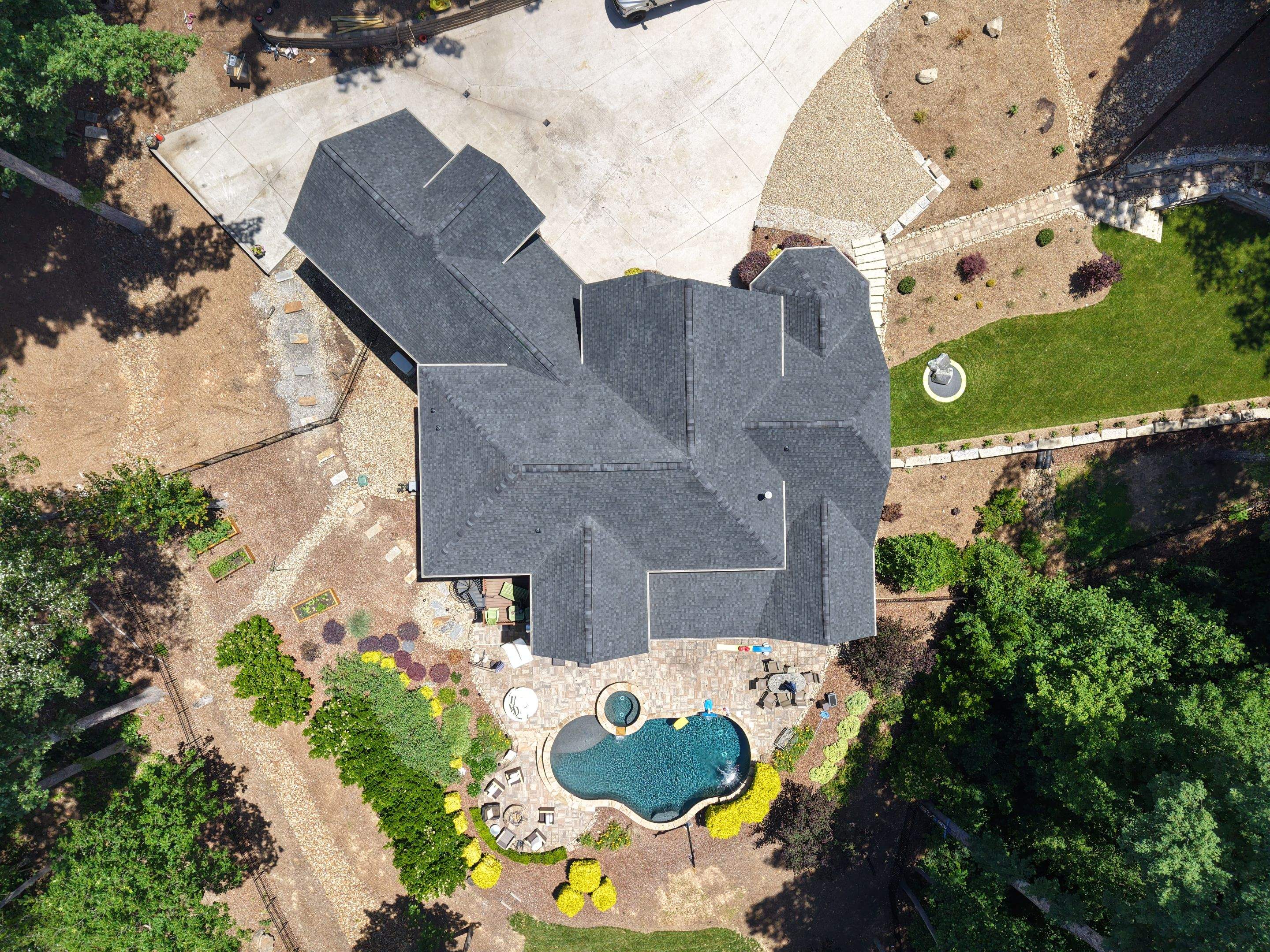 Residential Roofing Installation using TAMKO Titan XT Rustic Black by RISE Roofing & Restoration, LLC
