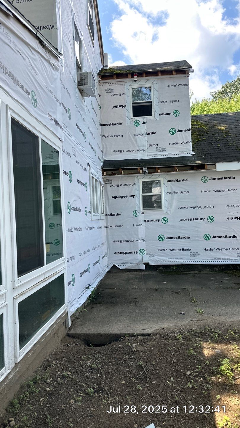 James Hardie Lap Siding Installation in Chelmsford, MA by Mighty Dog Roofing of Greater Middlesex County