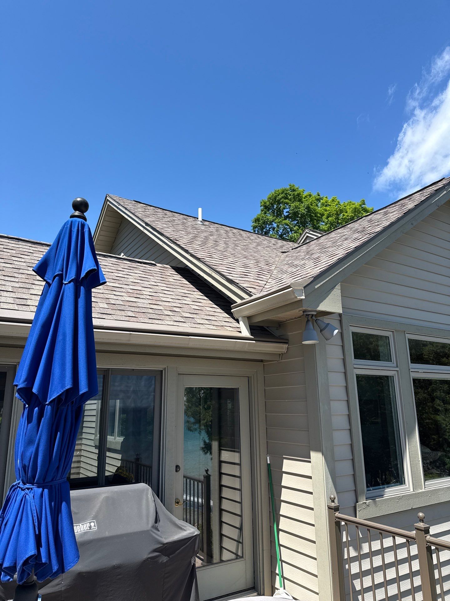 Custom Gutter Helmet Protection for Residential Roof in Suttons Bay by Rainbow Seamless Systems