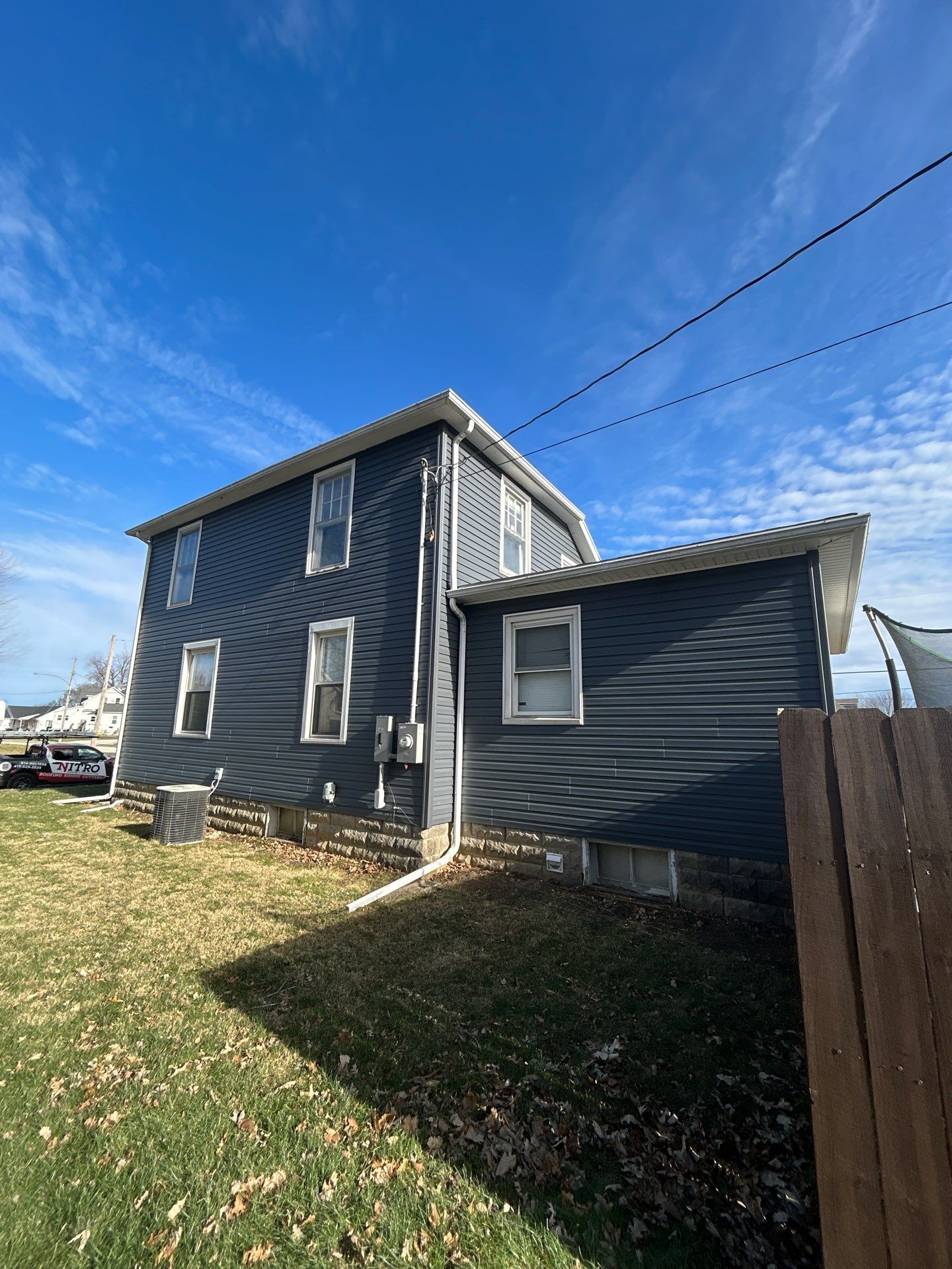 Siding Installation using D45DL Mastic CarvedWood - Natural Slate by Nitro Roofing and Construction