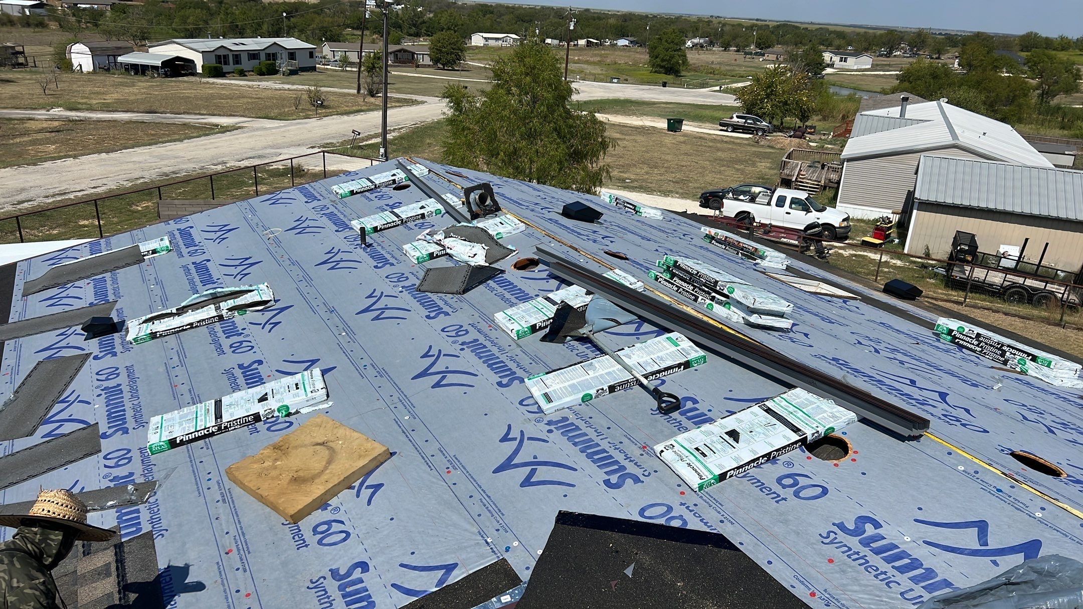 Residential Roofing Installation using ATLAS Pinnacle Pristine Shingles by Harvey Roofing & Construction