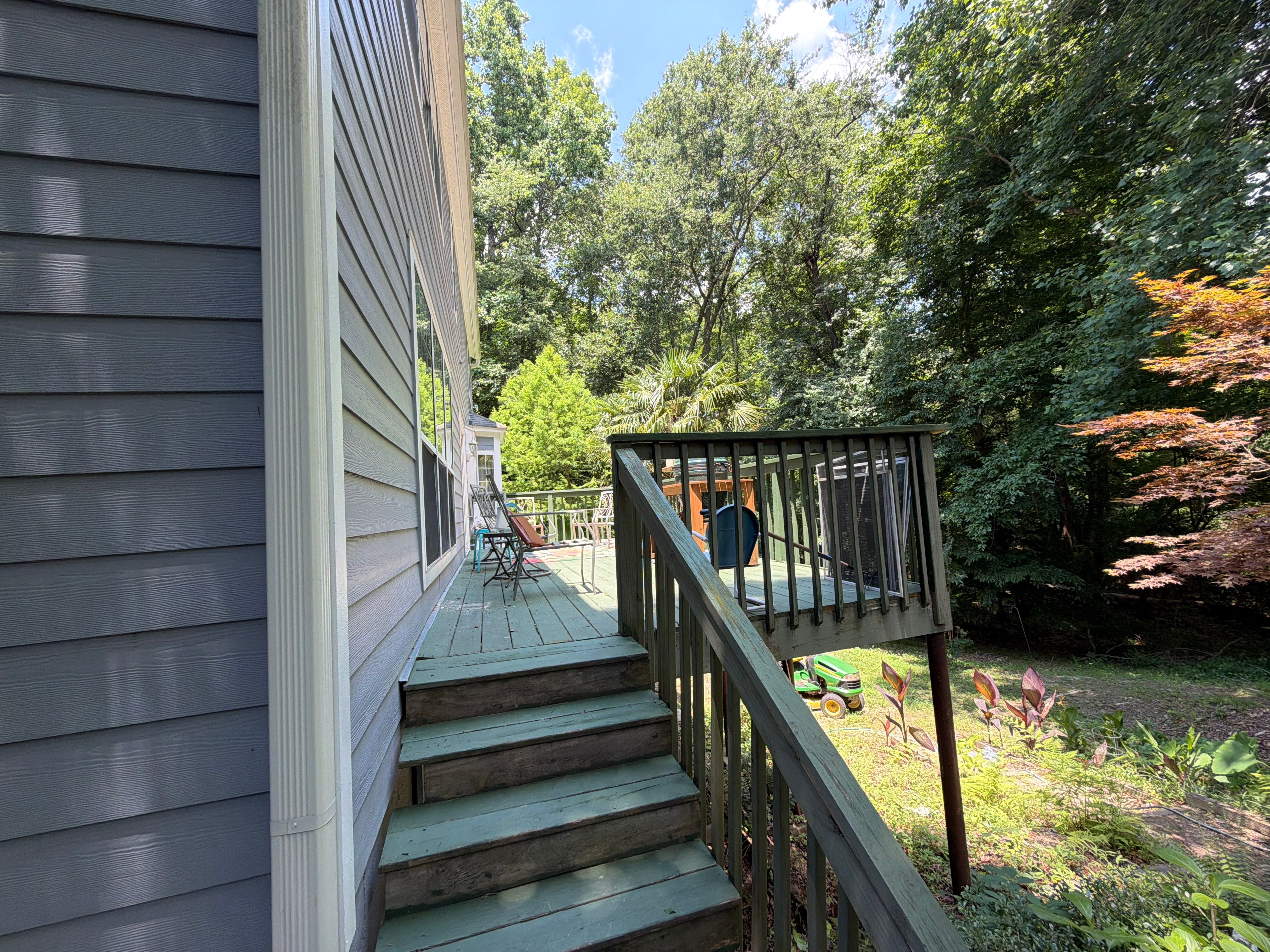 Gwinett County Wood Deck Resurface with Graspable Handrail by Nelson Exteriors 