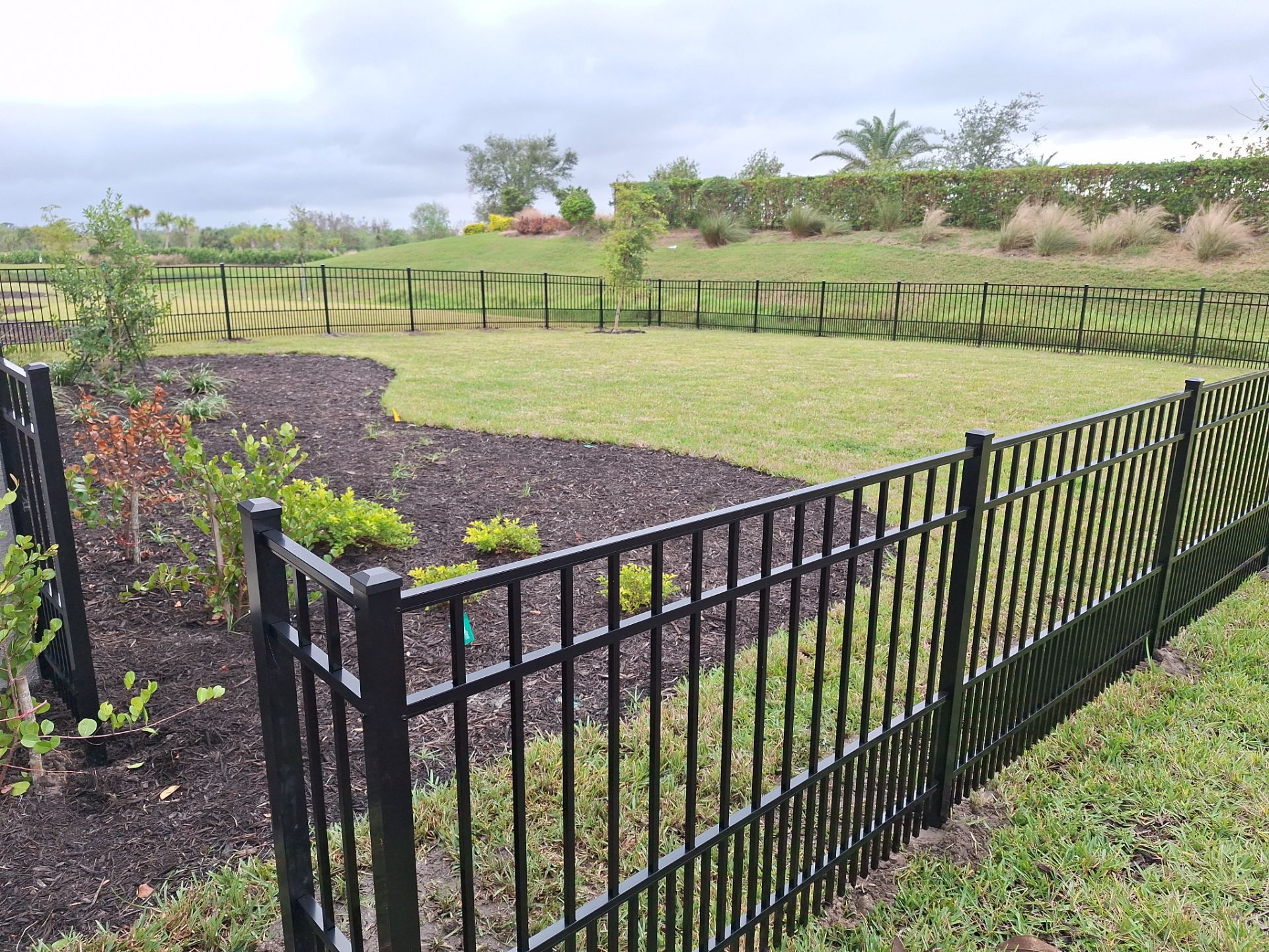 Aluminum Fence Installation using 4ft 3 Rail Black Aluminum Fence by Asap fence and gates, LLC