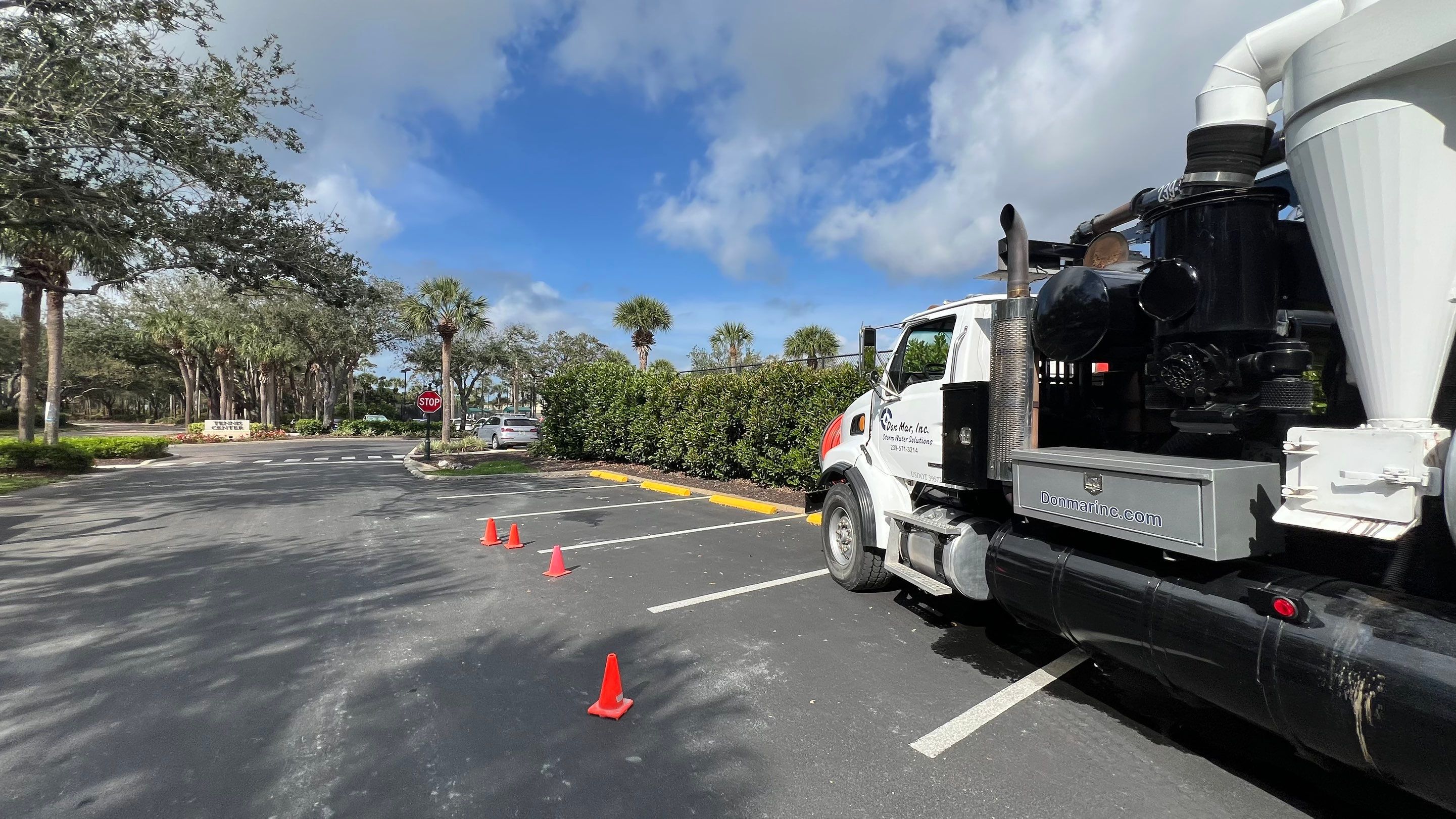Pelican Landing Tennis Court Catch Basin Cleaning by APS Power & Water