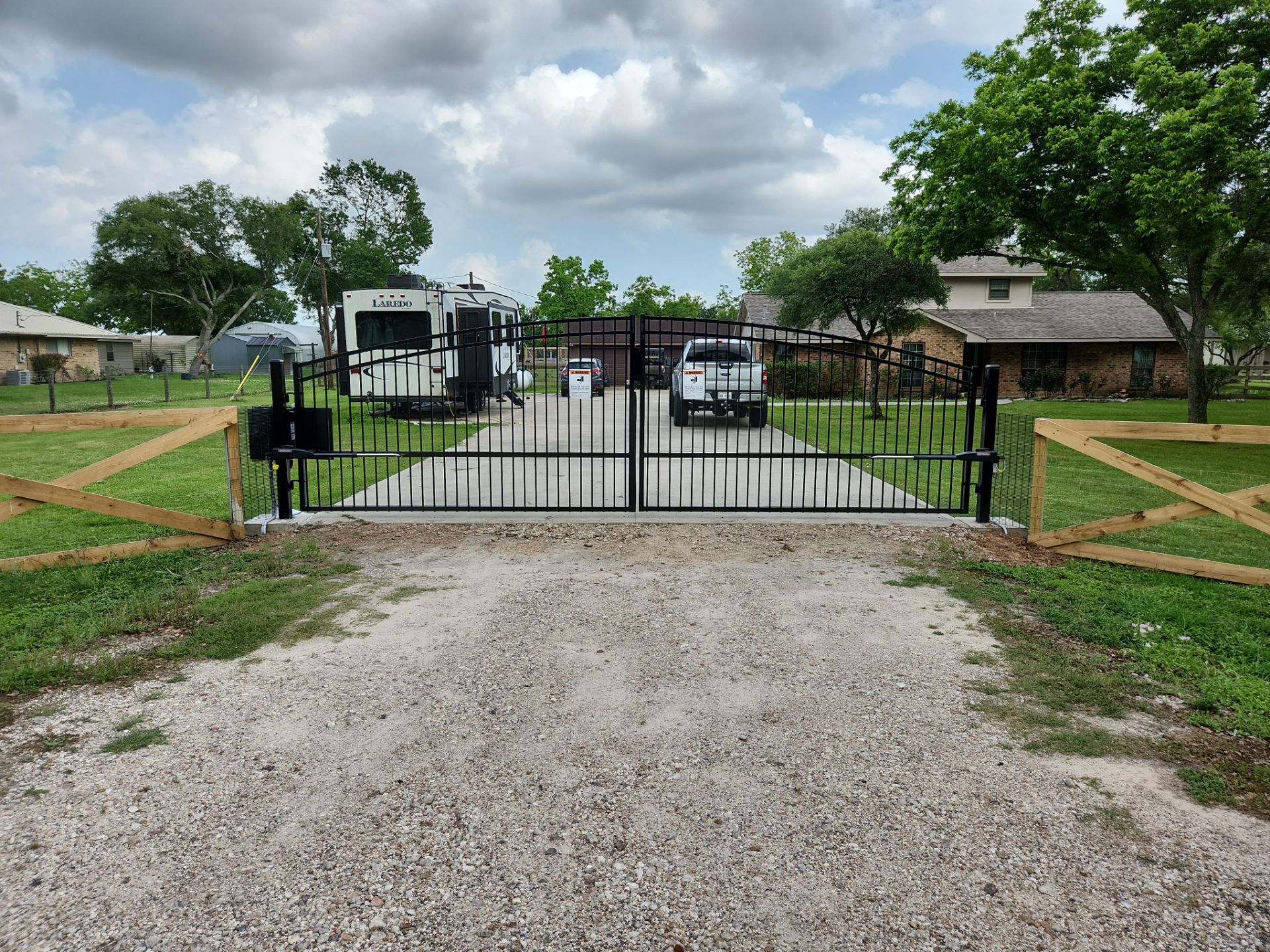 Custom Driveway Gate Powered by Solar by Tim's Fences