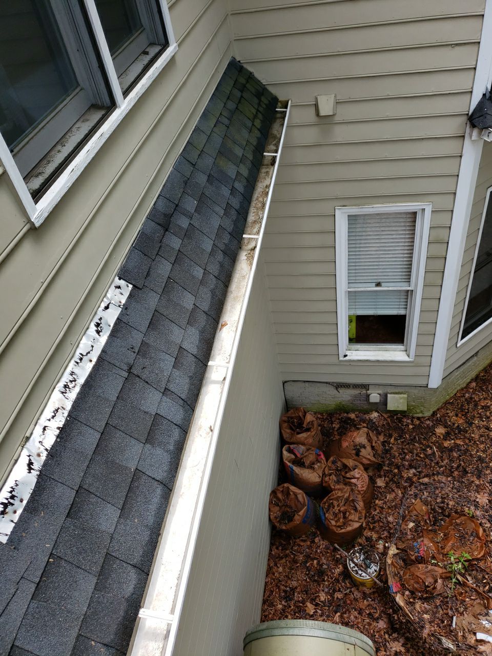 Gutter Cleaning using water by Power Wash Masters LLC