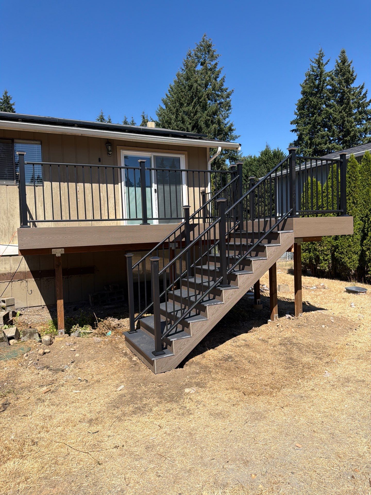 Composite Deck Installation with Black Metal Railings in Bonney Lake by Expedeck