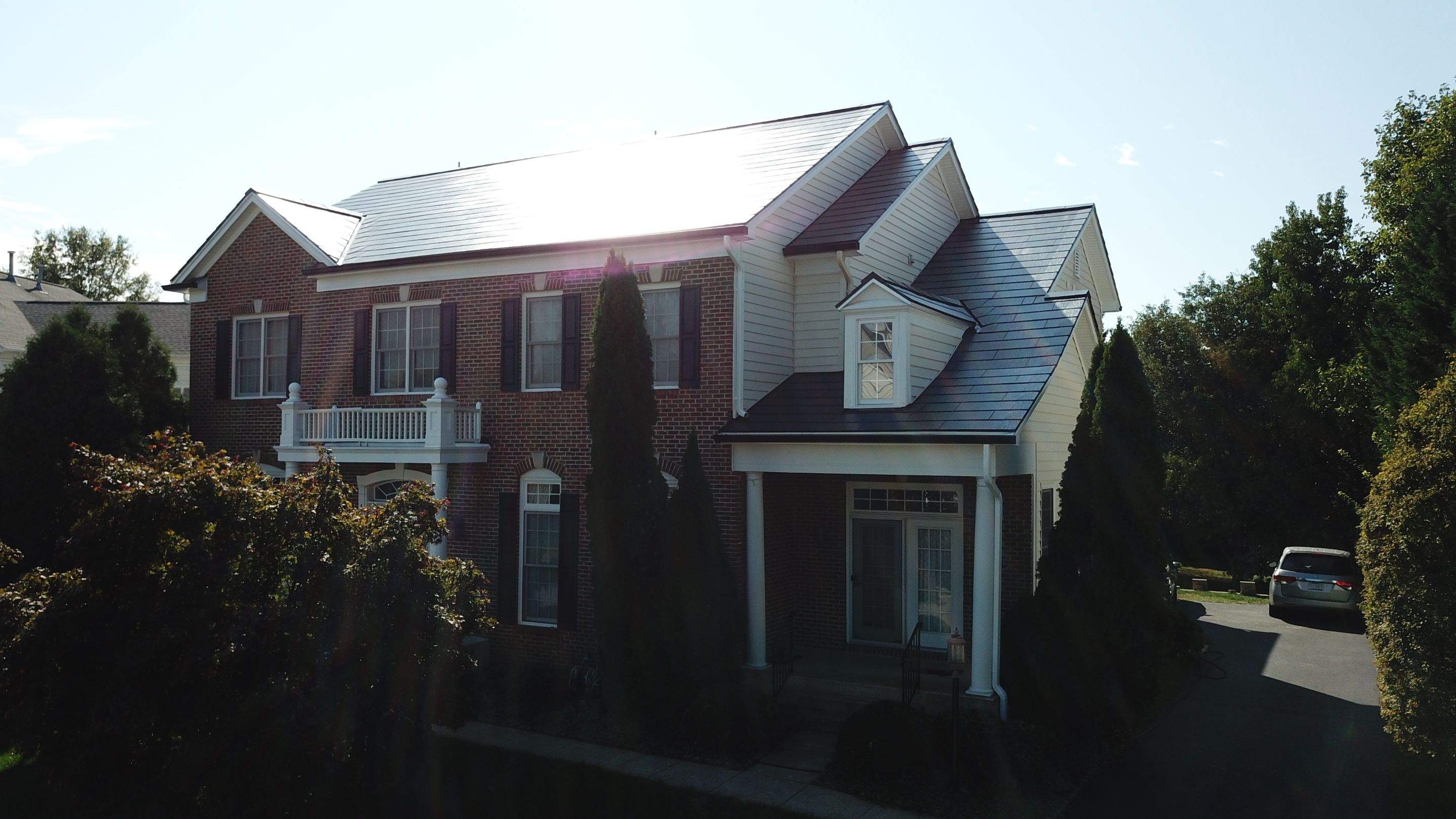 Tesla Solar Roof Replacement using Tesla Solar Roof V3 tiles by American Home Contractors