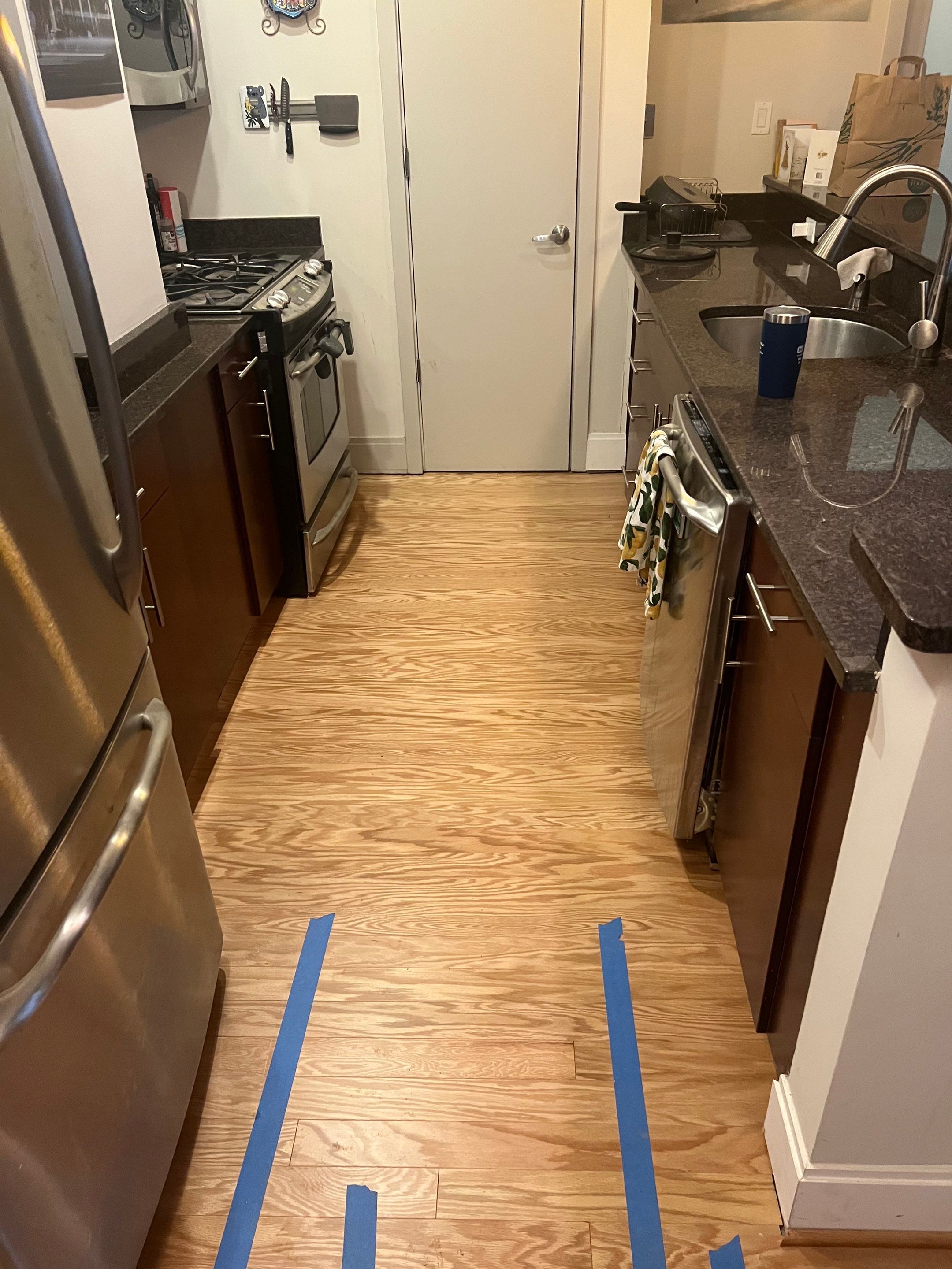 Engineered Hardwood & Carpet Installation by Greenspring Construction Services