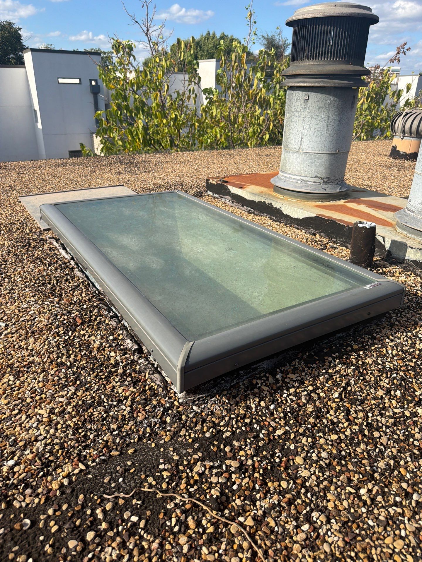 Comprehensive Roof Replacement for Dallas Residential Flat Gravel System by Rich the Roofer LLC
