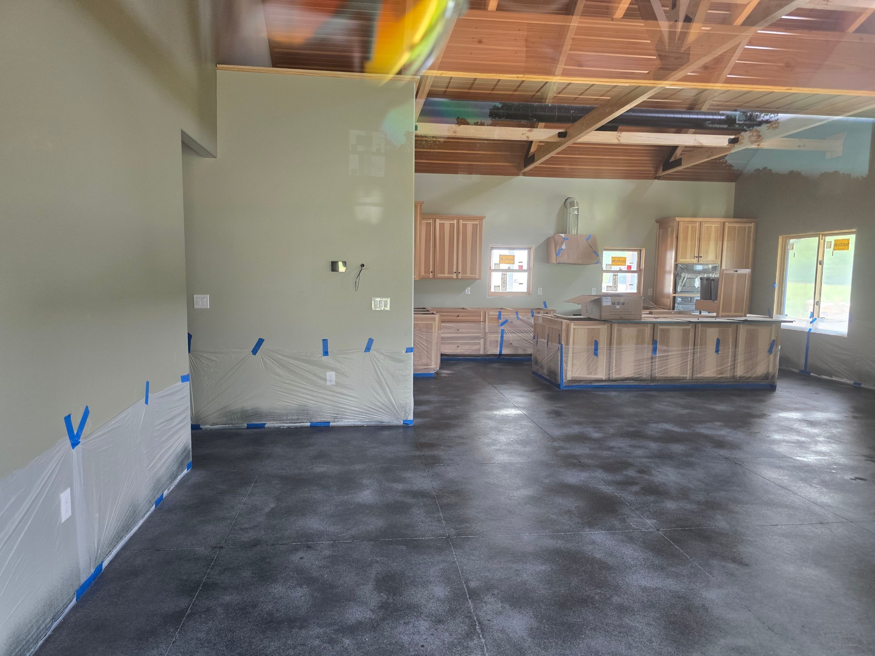Home Renovation using Grind, Stain, & Seal by Elite Floor Solutions