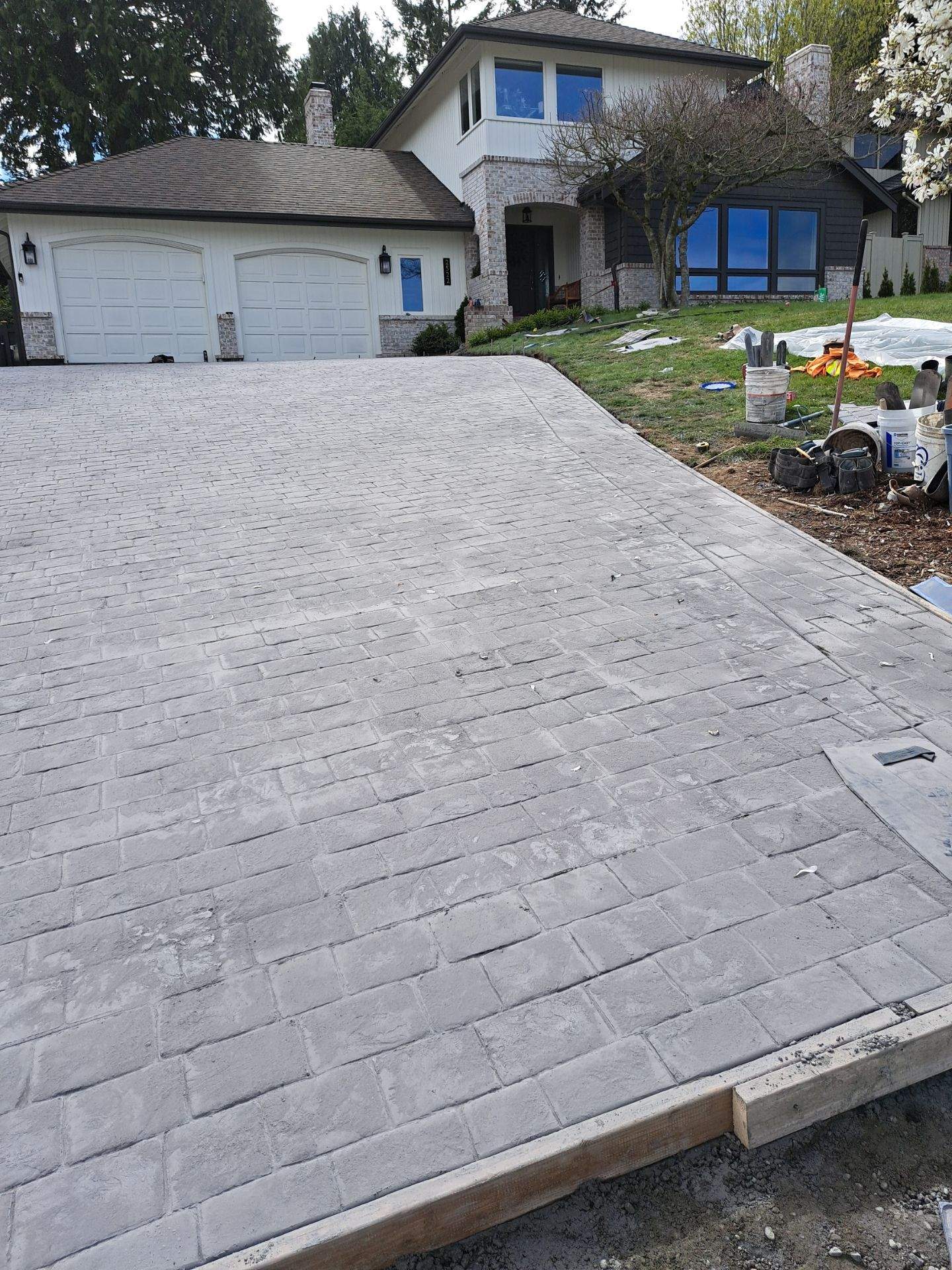 John | Stamped Concrete Driveway Makeover by Jireh Asphalt & Concrete Inc 