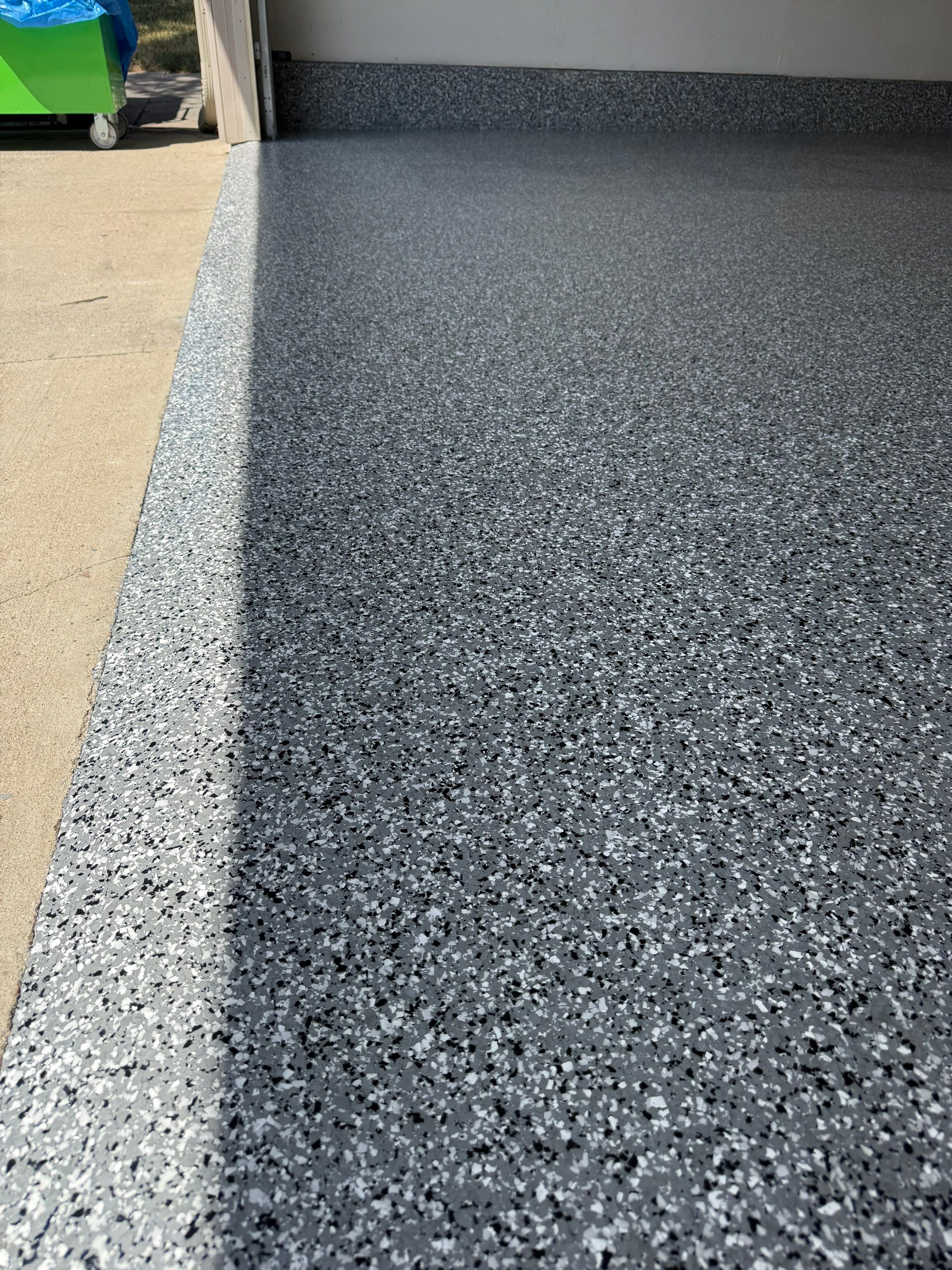 Smoke Flake Garage Floor Coating in Dell Rapids by Select Painting, Coatings & Garage Cabinets