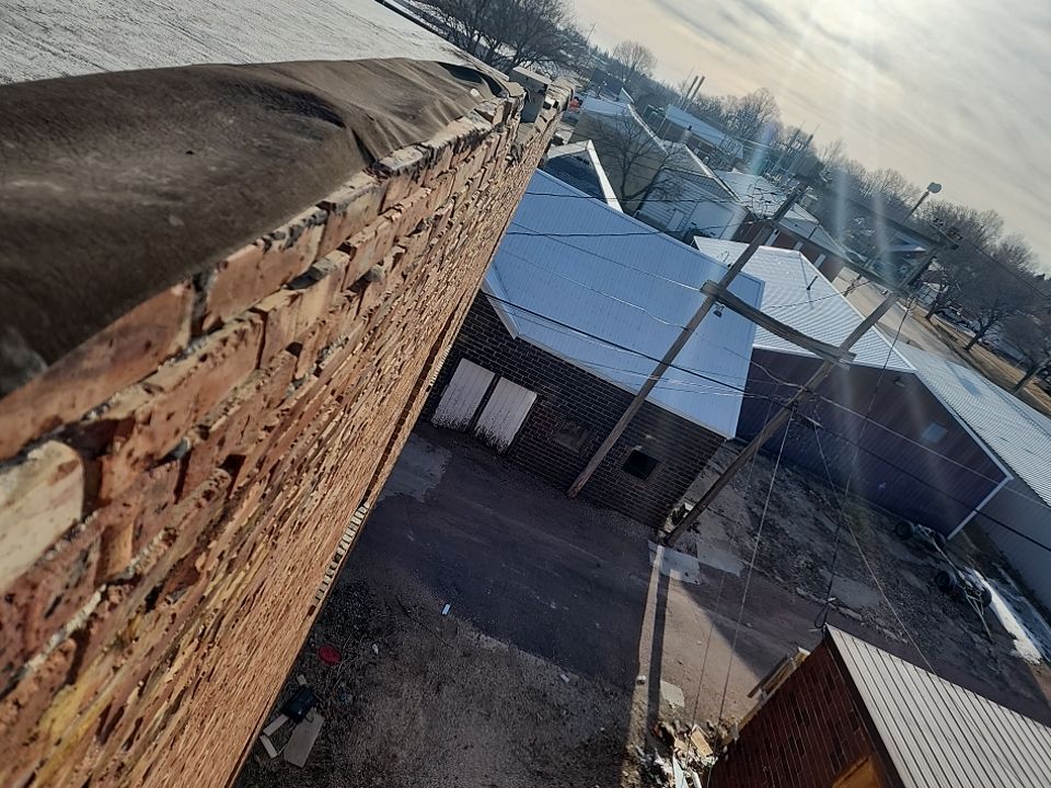 Recover of a downtown building  by Grell Roofing, LLC