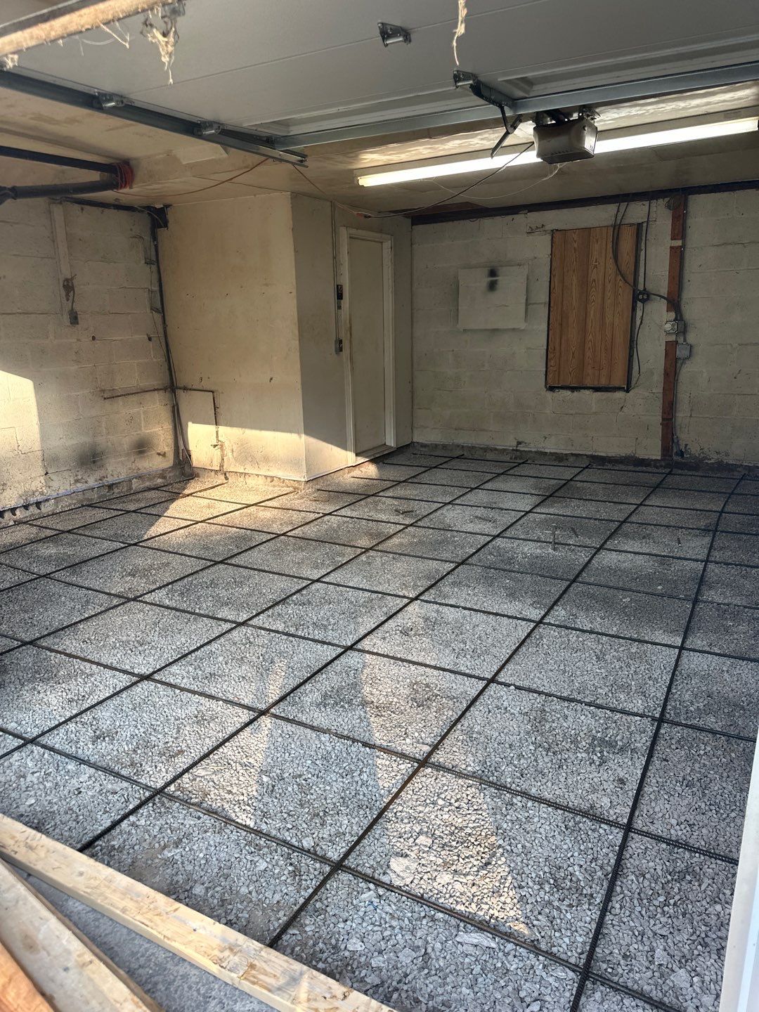 Concrete garage floor replacement  by NG Masonry & Construction LLC