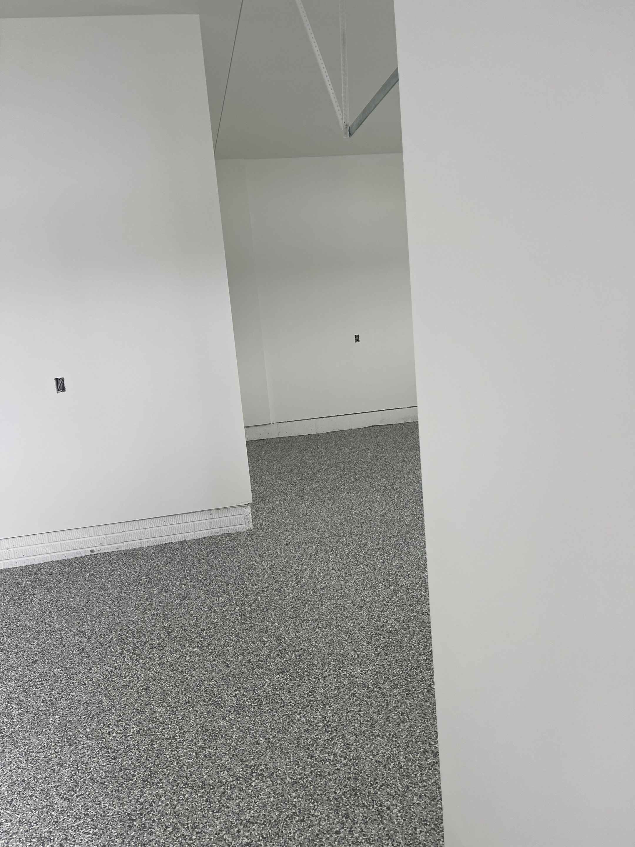 Garage using Slate Stone by Select Painting, Coatings & Garage Cabinets