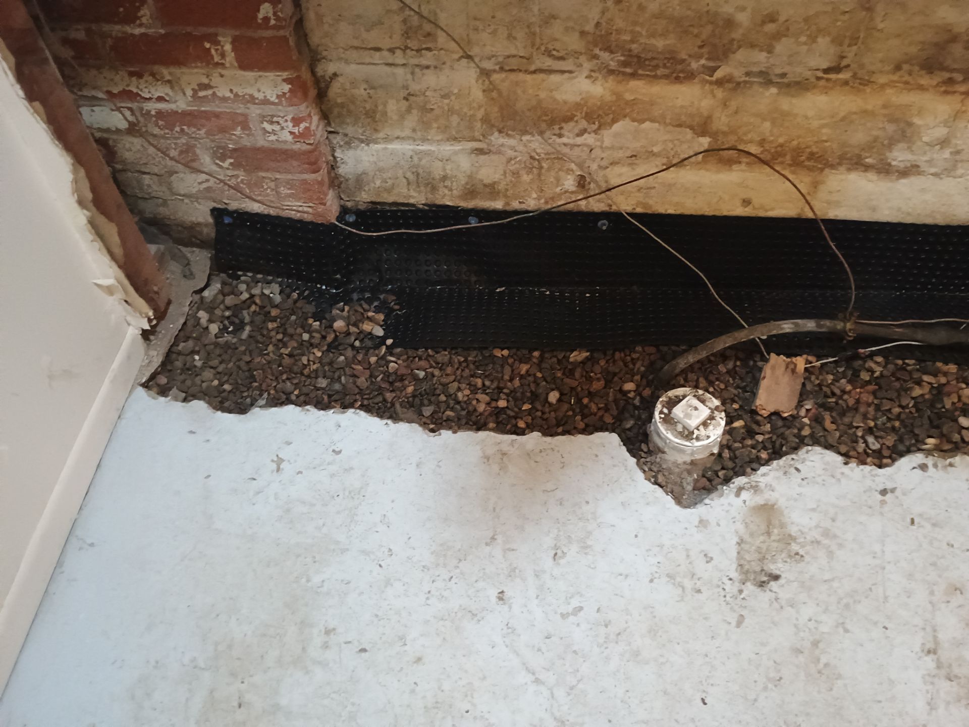 Interior Drain Tile & Sump Pump Installation in St. Paul, MN by Waterproofing Northeast