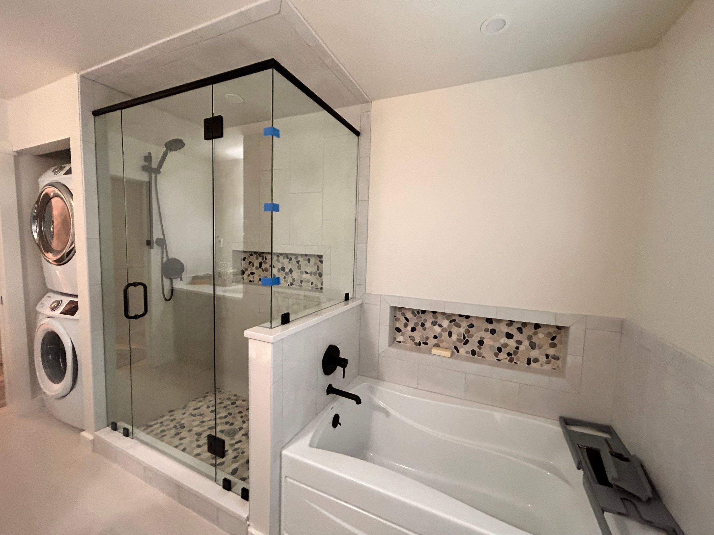 Frameless Shower Enclosure w/Header Bar by Cheshire Glass Company
