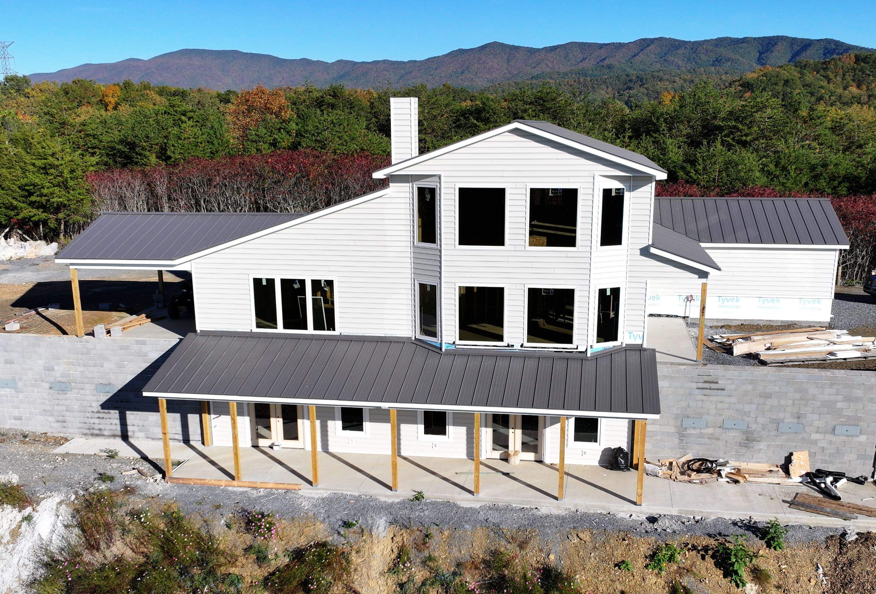 Textured Charcoal Gray Standing Seam by Omnia Roofing