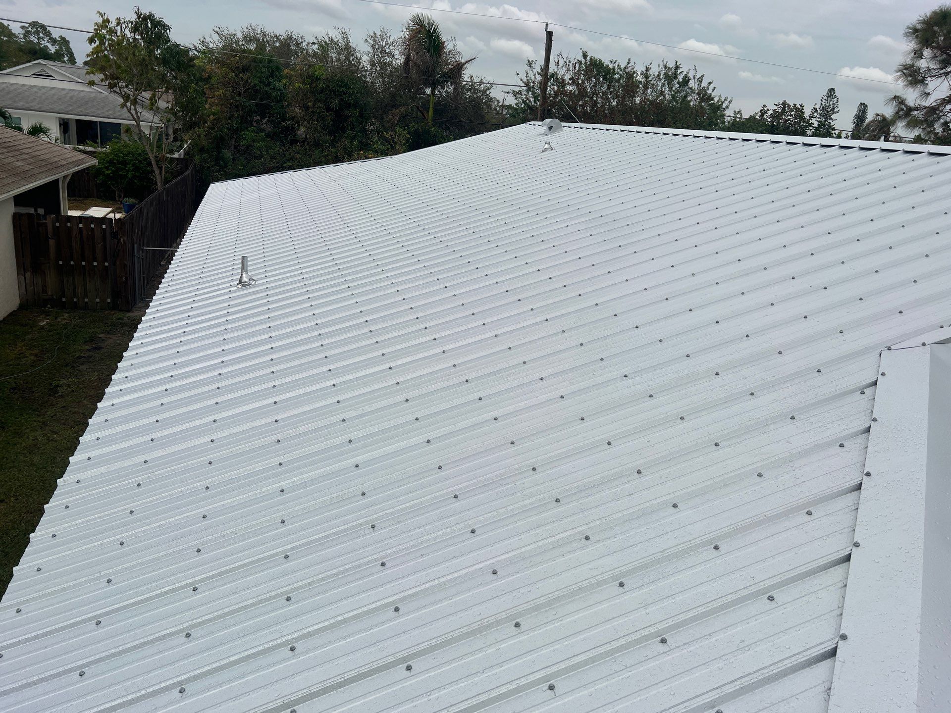 Residential Roofing Installation using Durabull Classic Rib Panel by Durabilis Roofing INC