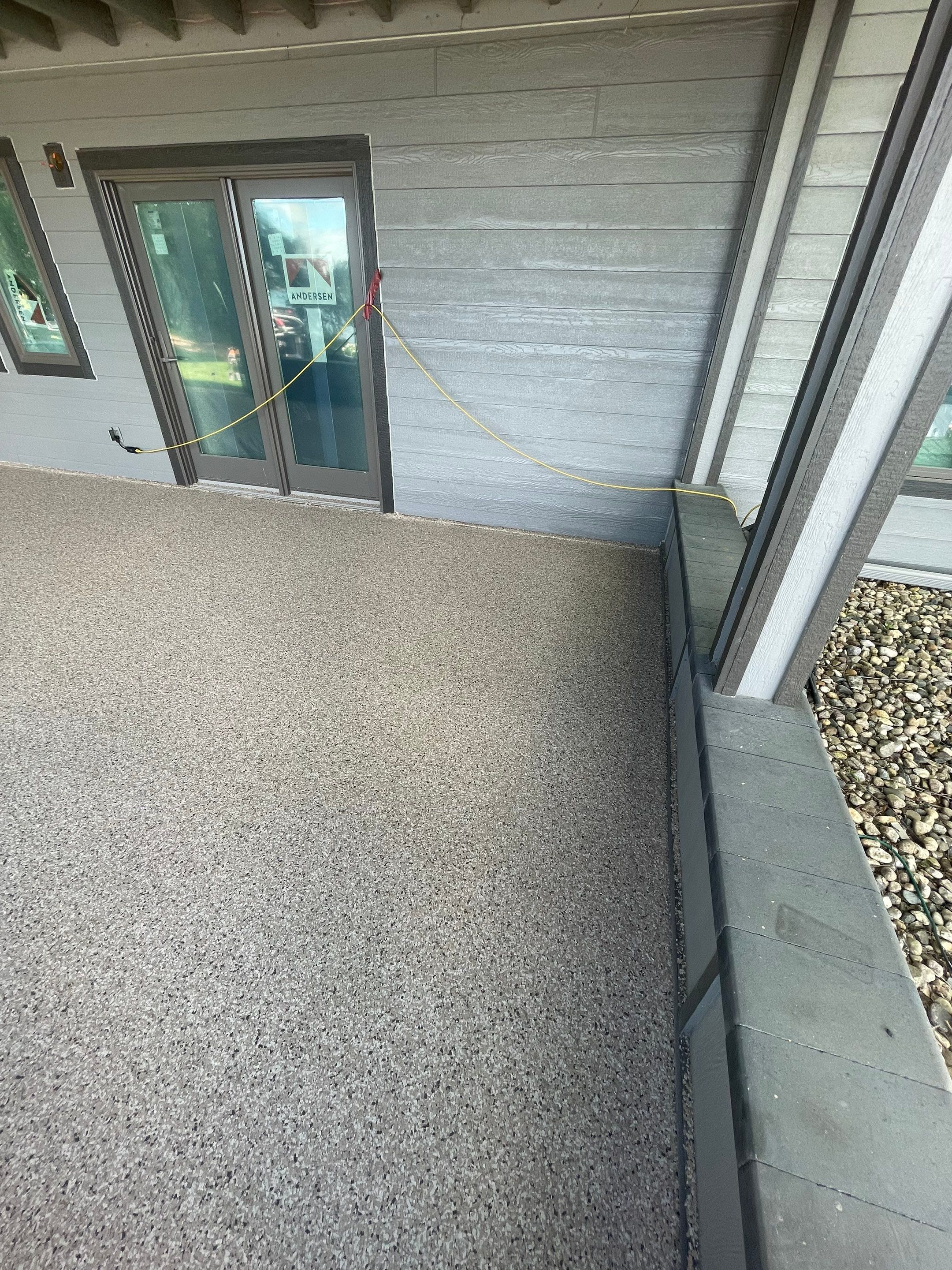 Lakefront Screened Patio Concrete Coating Installation in Wentworth by Select Painting, Coatings & Garage Cabinets